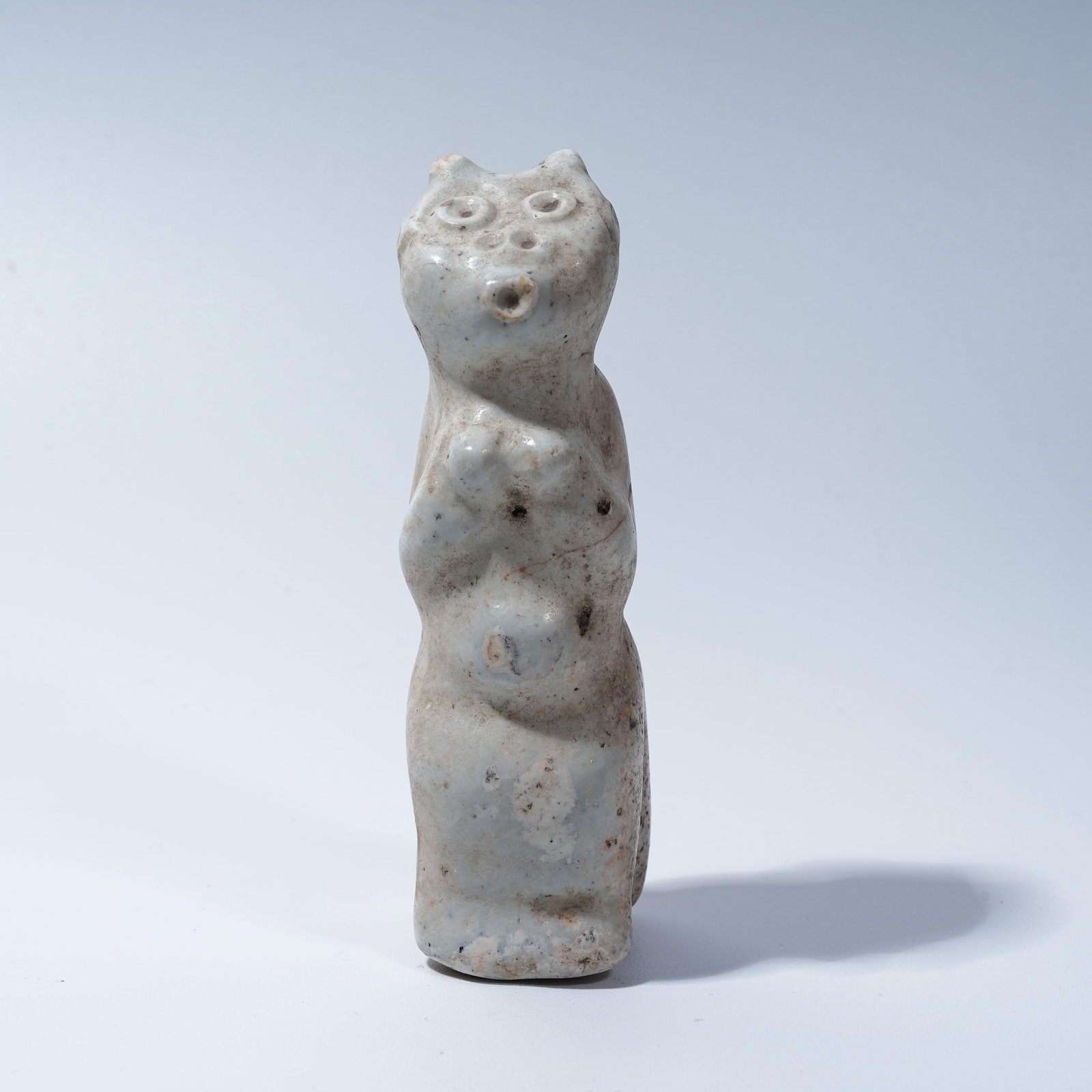 A HONGSHAN CULTURE ARCHAIC JADE ANTHROPOMORPHIC DEITY PENDANT: Hongshan Culture archaic jade anthropomorphic deity pendant