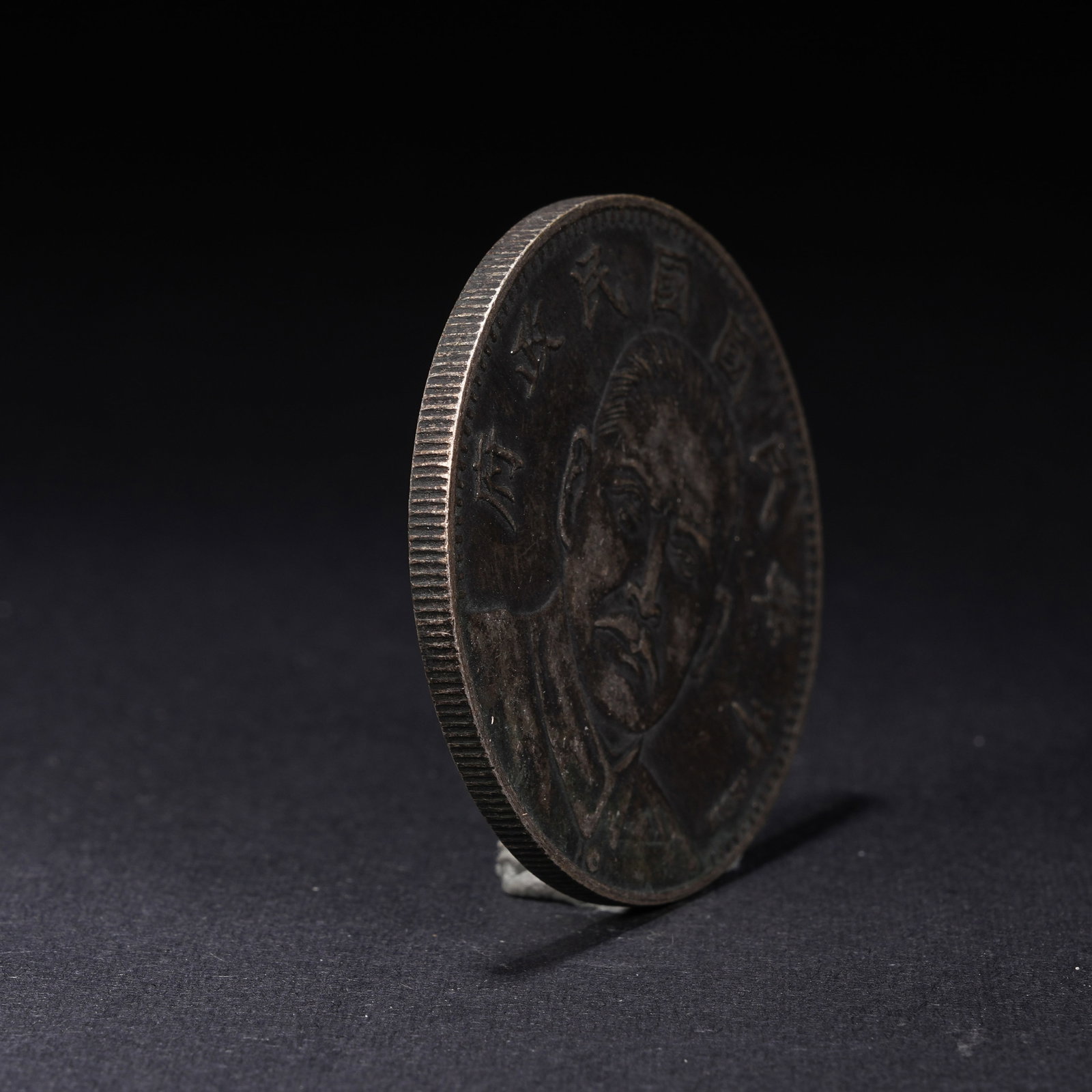 A SILVER DOLLAR COIN - 2