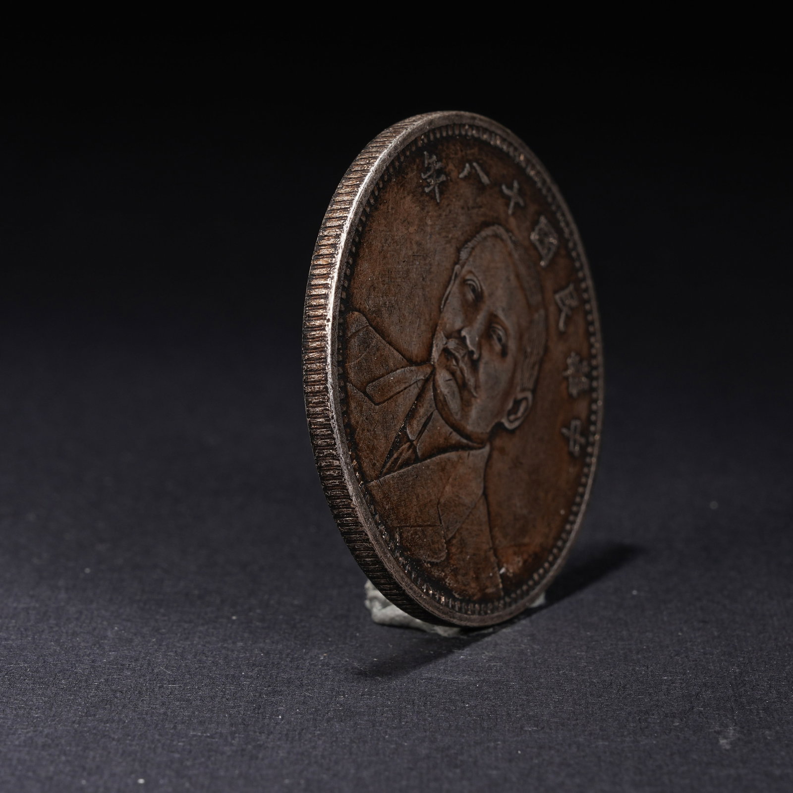 A SILVER DOLLAR COIN - 2