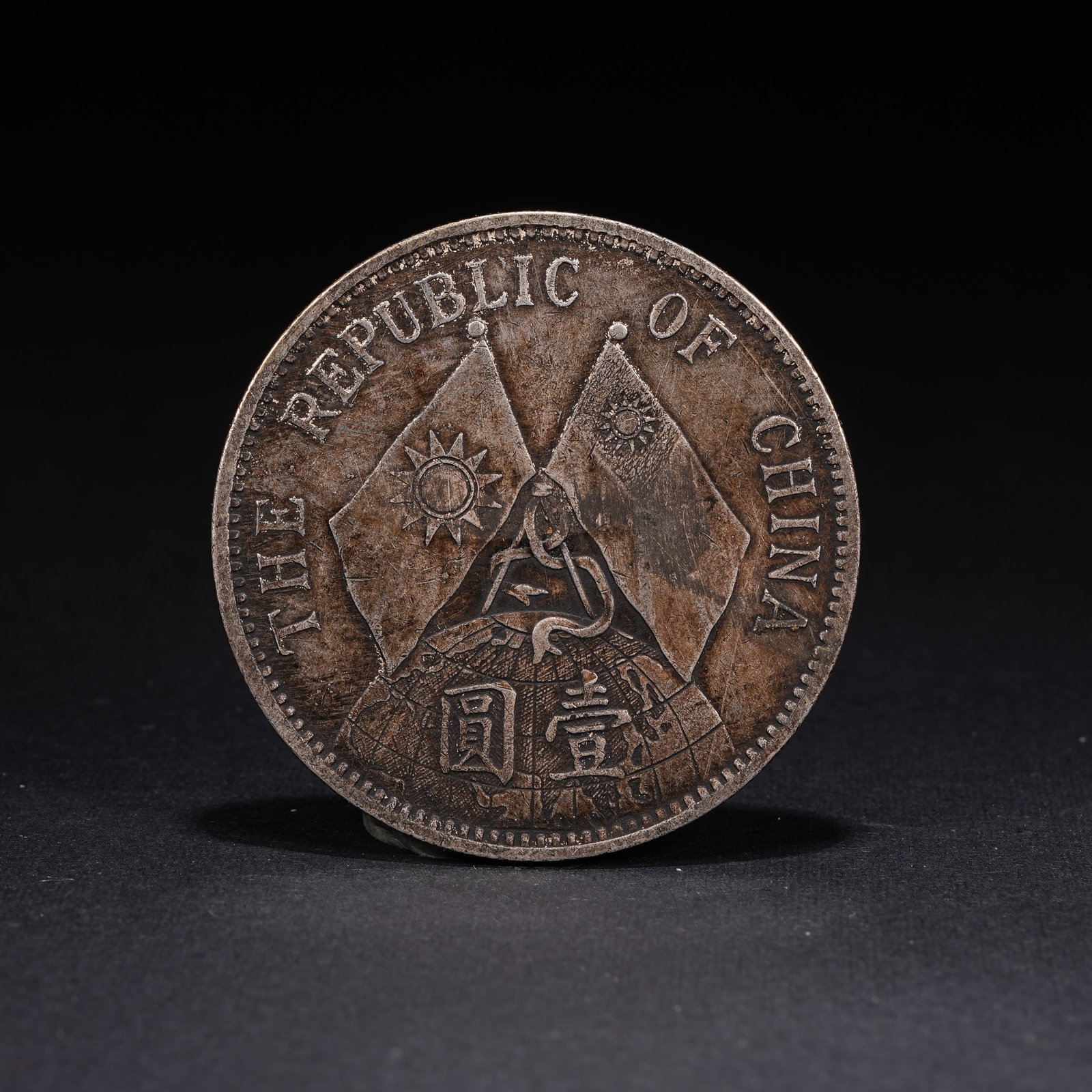 A SILVER DOLLAR COIN - 3