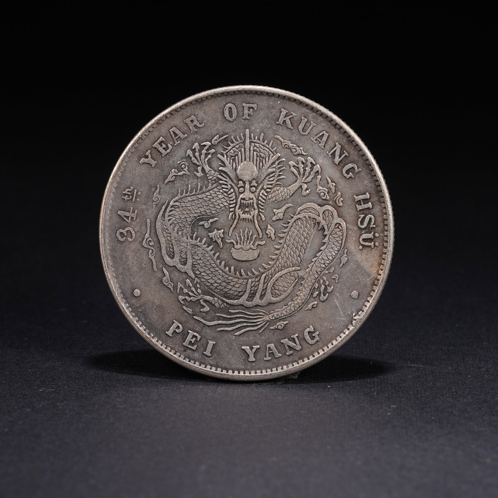 A SILVER DOLLAR COIN - 3