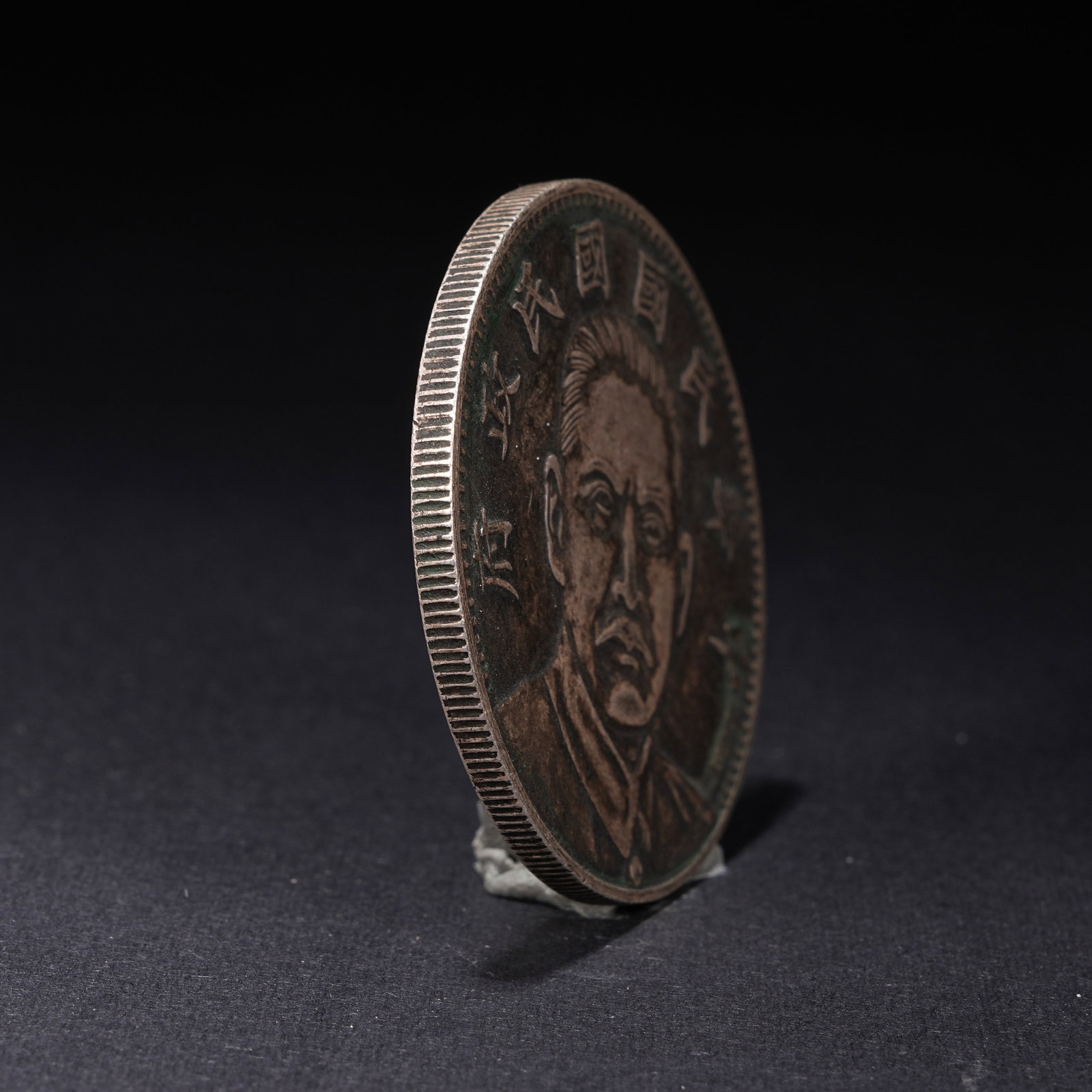 A SILVER DOLLAR COIN - 2