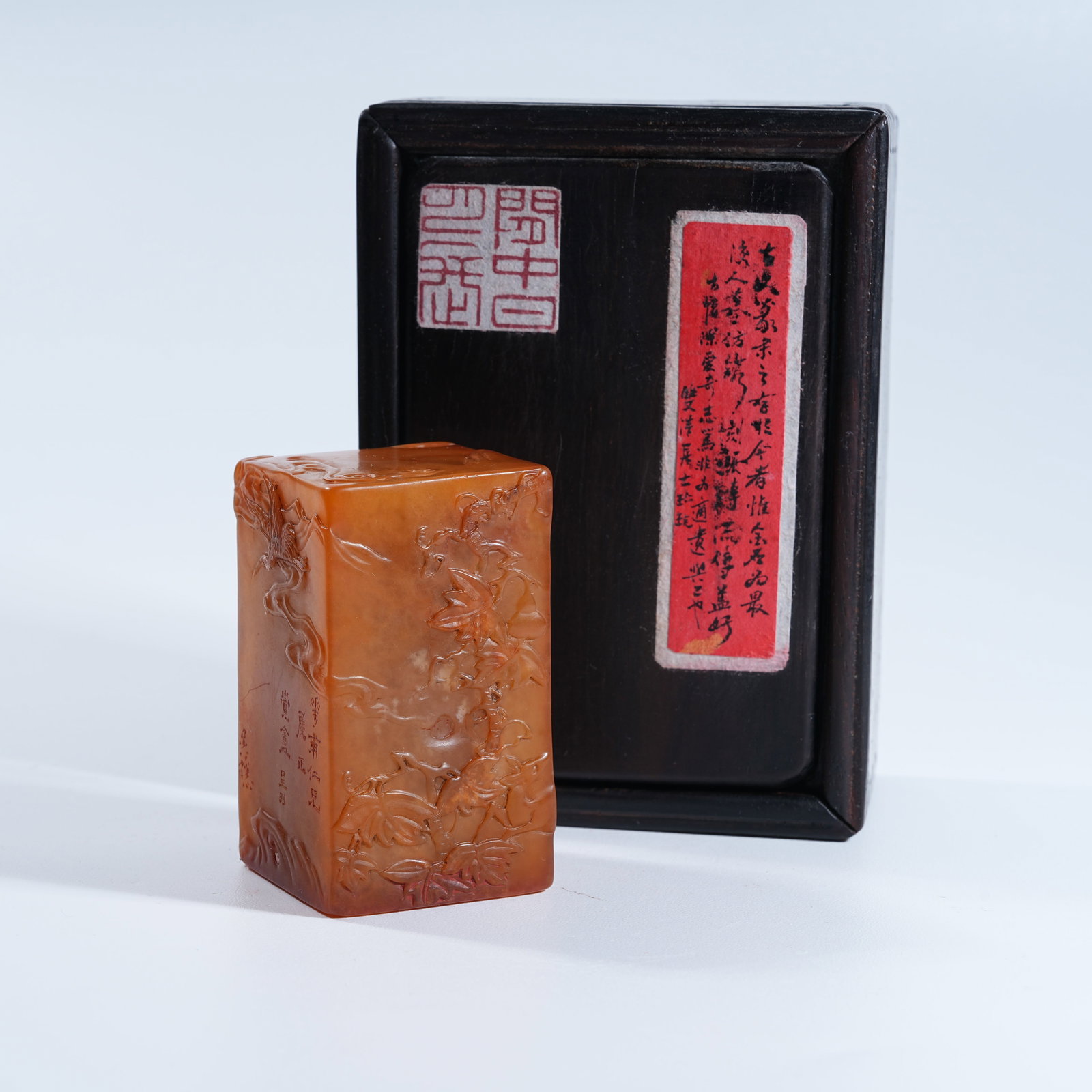 A SHOUSHAN TIANHUANG STONE SEAL WITH CLOUD AND CRANE PATTERN: Shoushan Tianhuang Stone Seal with Cloud and Crane Pattern