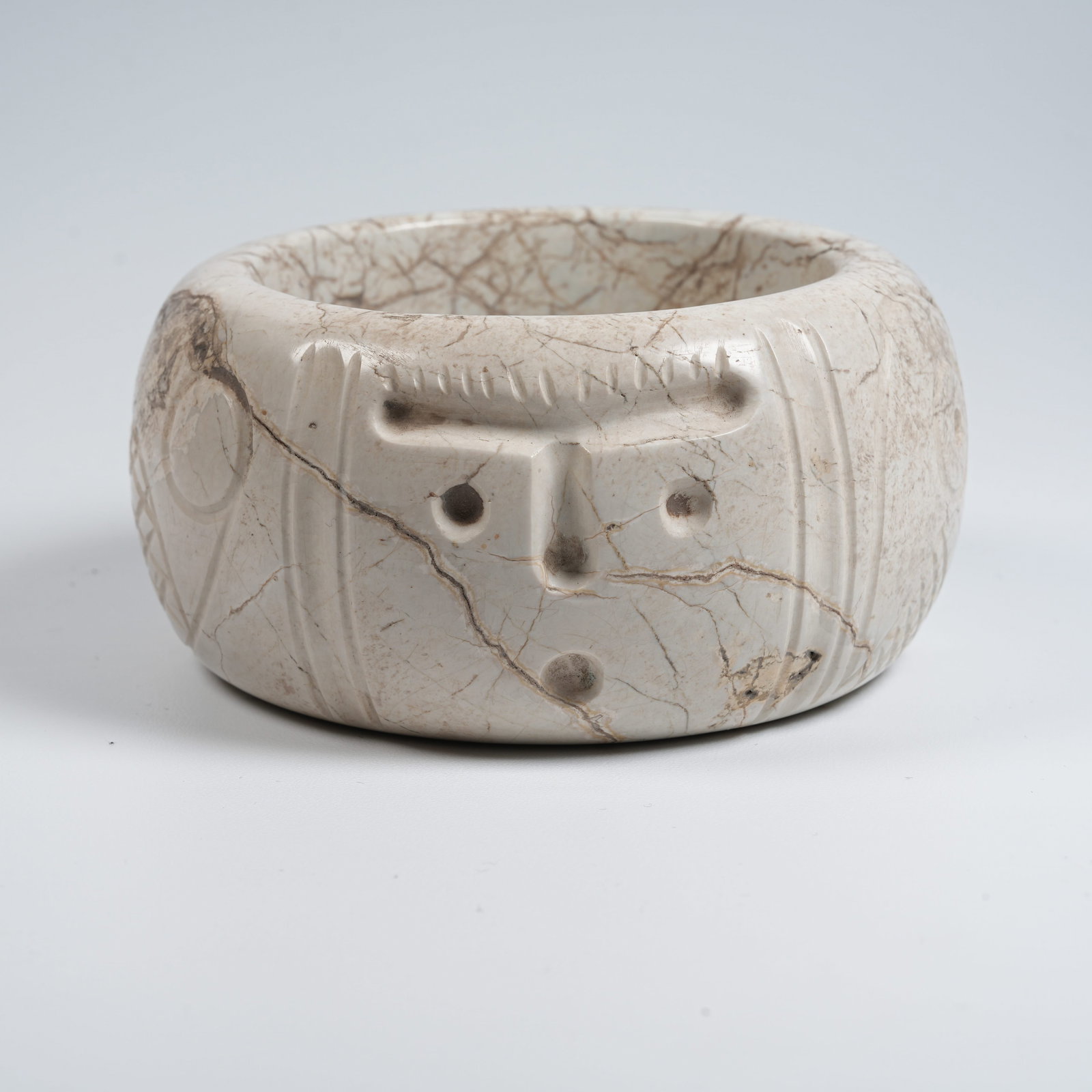 A HONGSHAN CULTURE ARCHAIC JADE ANTHROPOMORPHIC FACE BRACELET (1 of 10)