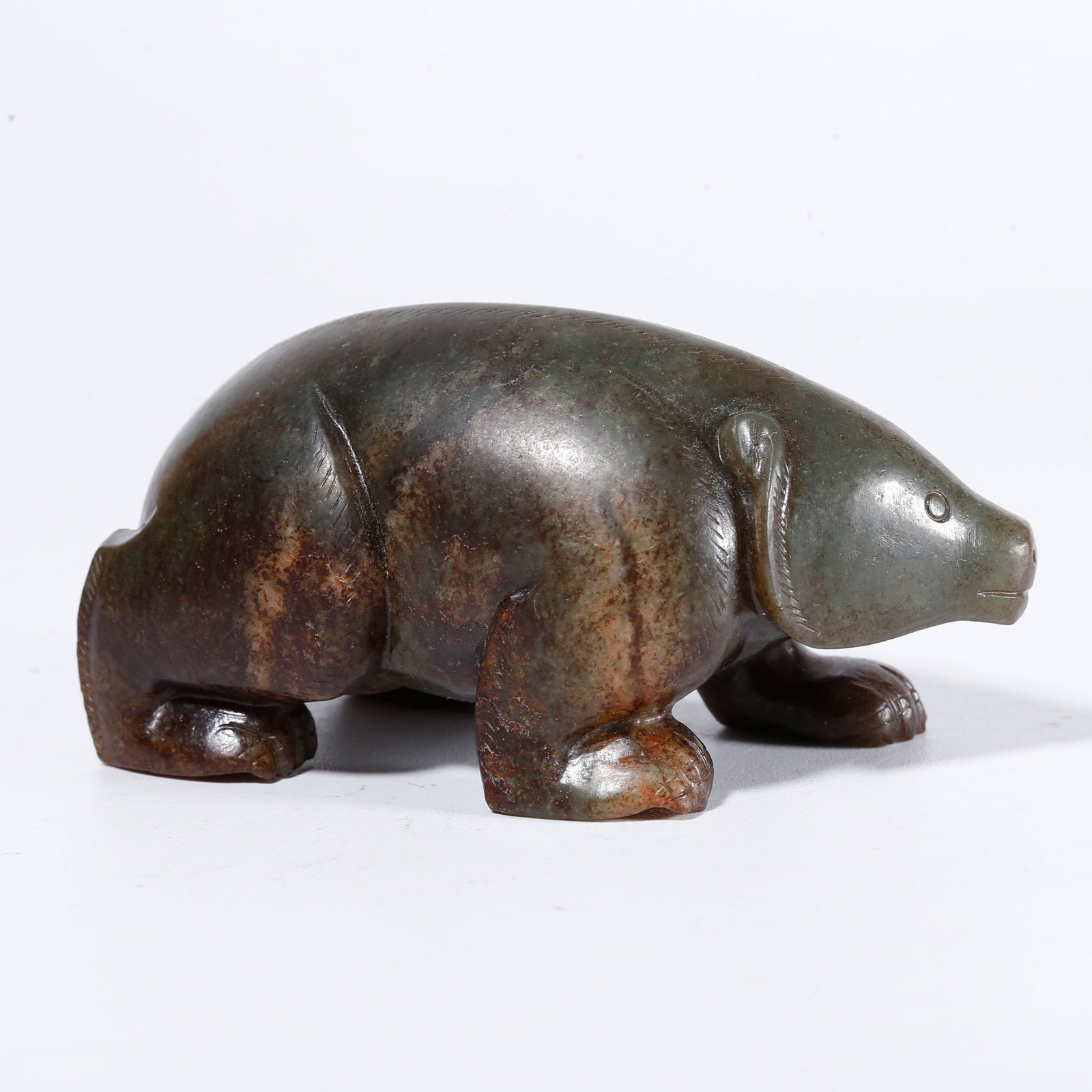 A HETIAN JADE CARVED BEAR FIGURINE (1 of 10)