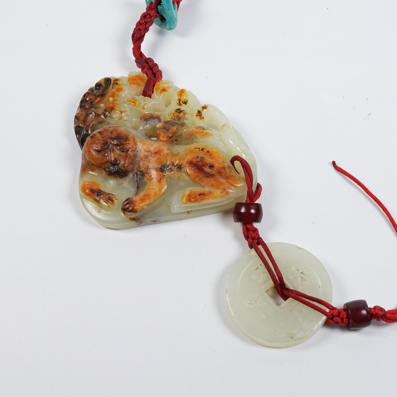 A GROUP OF MEDIEVAL JADE PENDANTS (1 of 11)