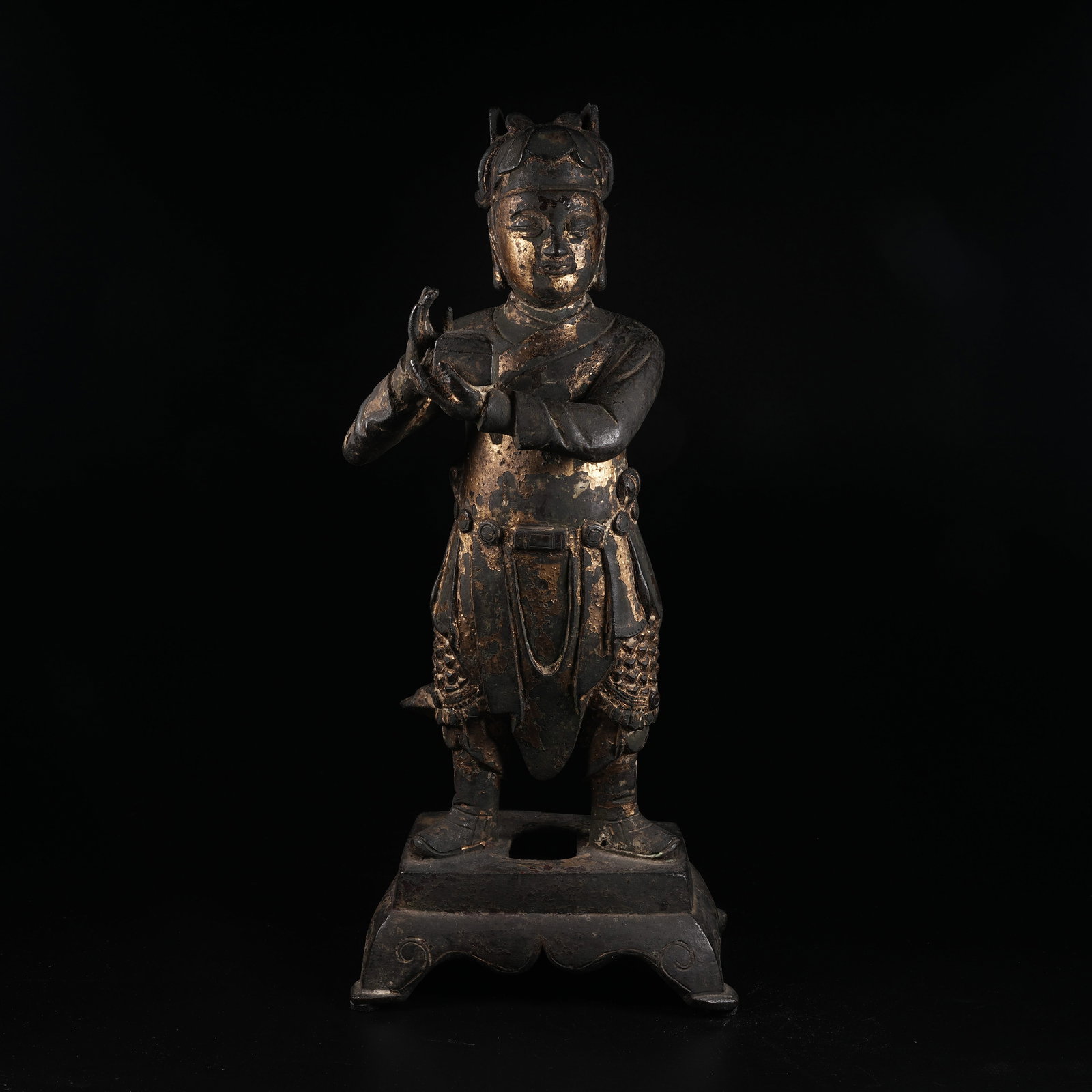 A GOLD-PAINTED COPPER STANDING GUAN PING STATUE (1 of 10)
