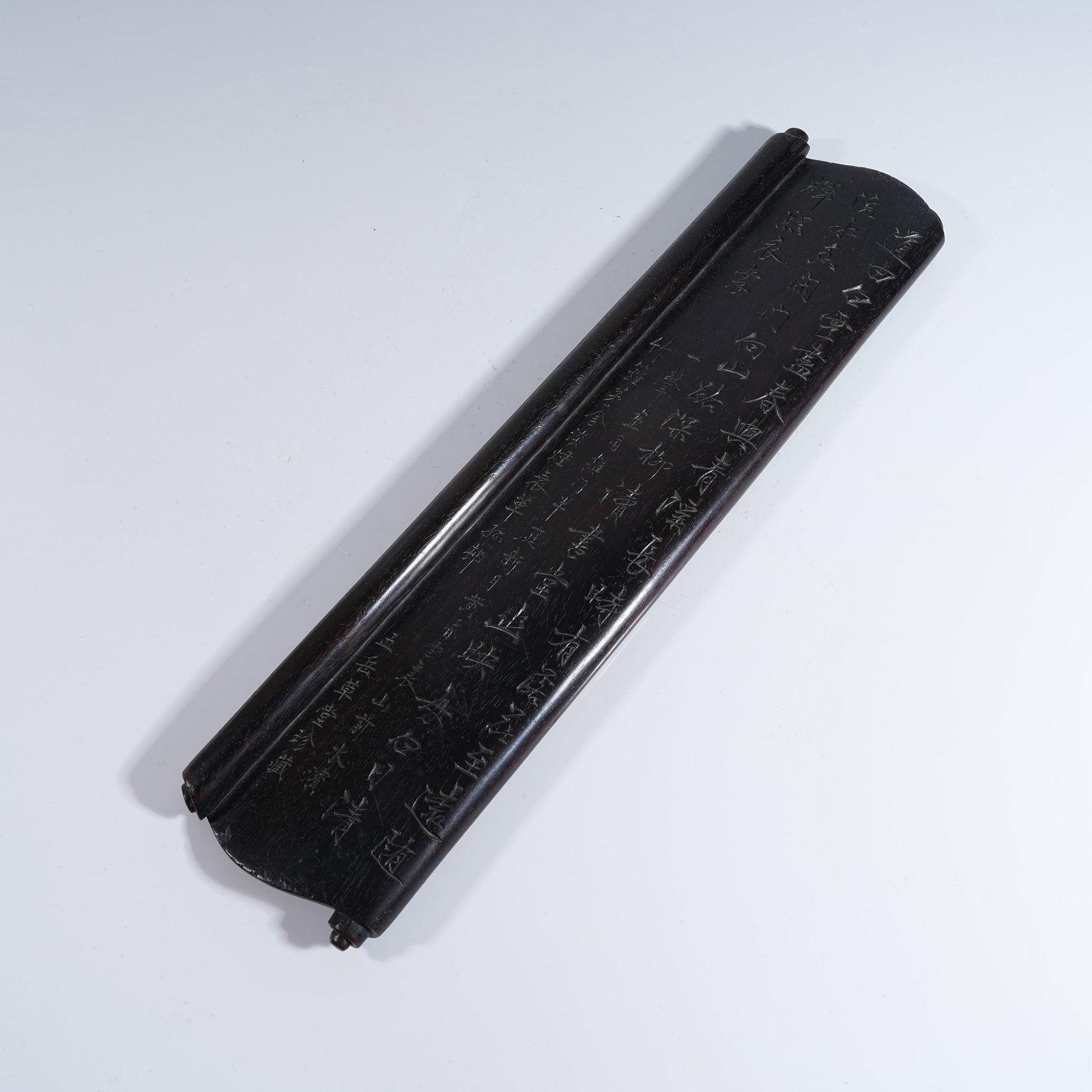 A SMALL-LEAF RED SANDALWOOD ARM REST CARVED WITH POETIC INSCRIPTIONS: Small-leaf Red Sandalwood Arm Rest Carved with Poetic Inscriptions