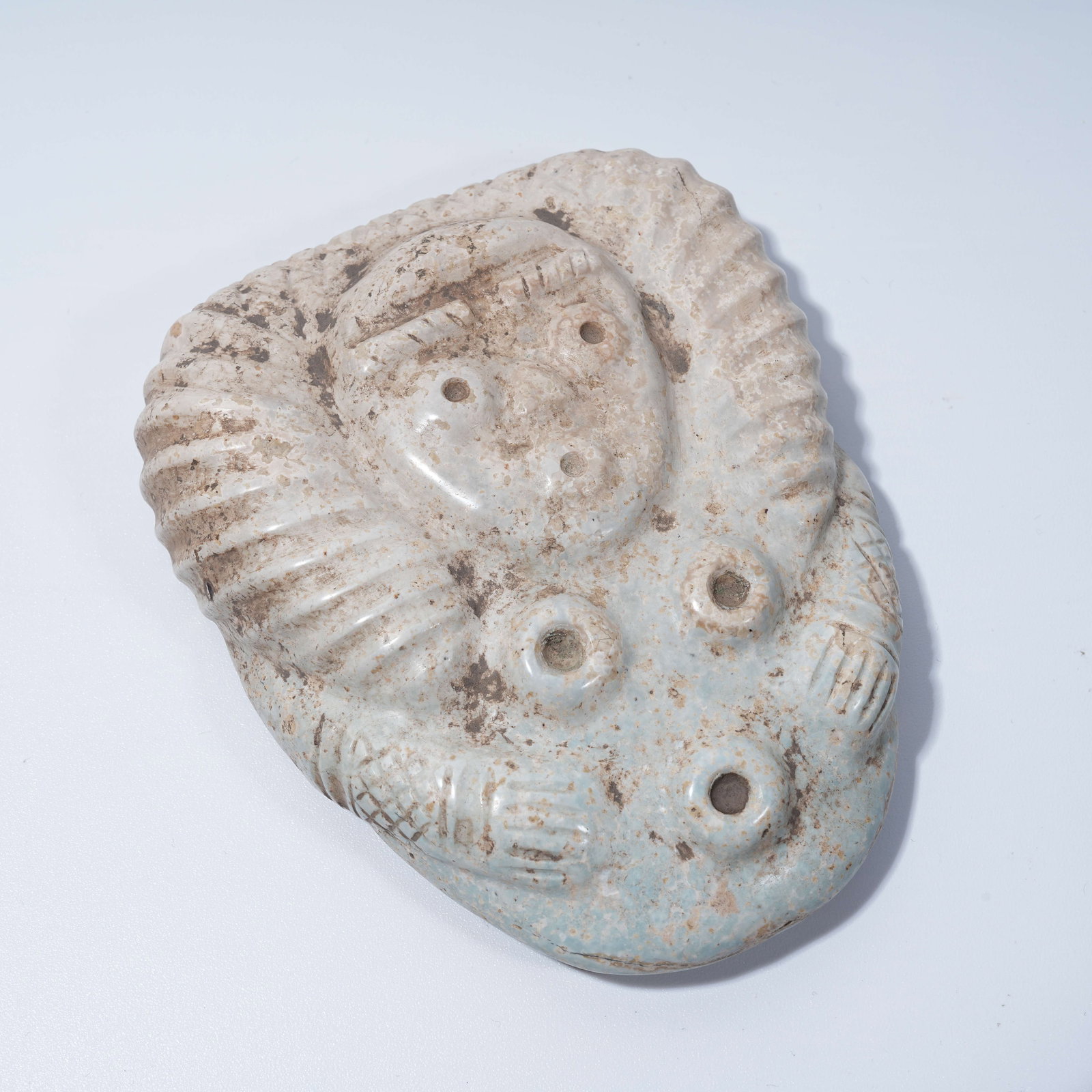 A HONGSHAN CULTURE ARCHAIC JADE ANTHROPOMORPHIC DEITY PENDANT (1 of 9)