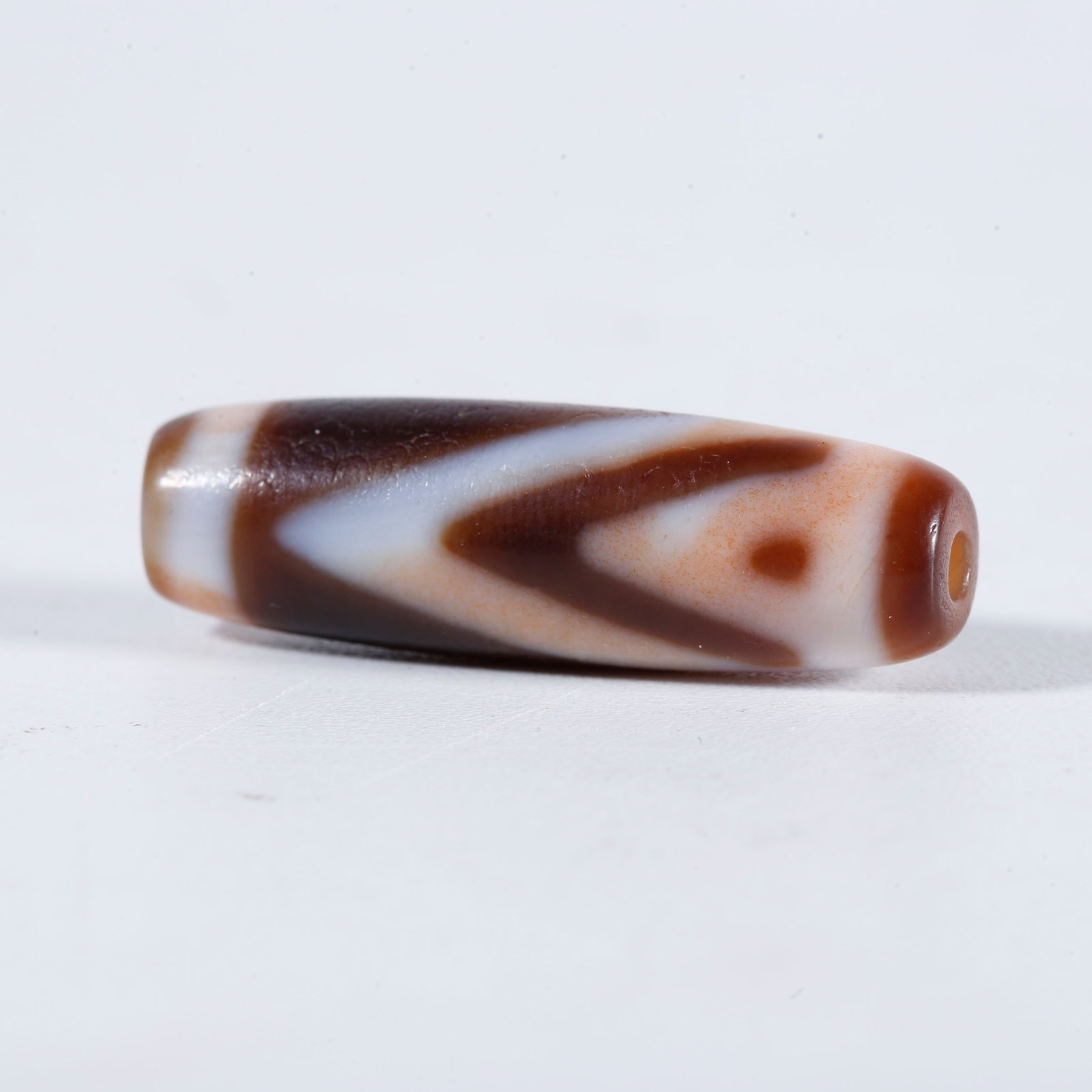 A ONE-EYE DZI BEAD: One-Eye Dzi Bead