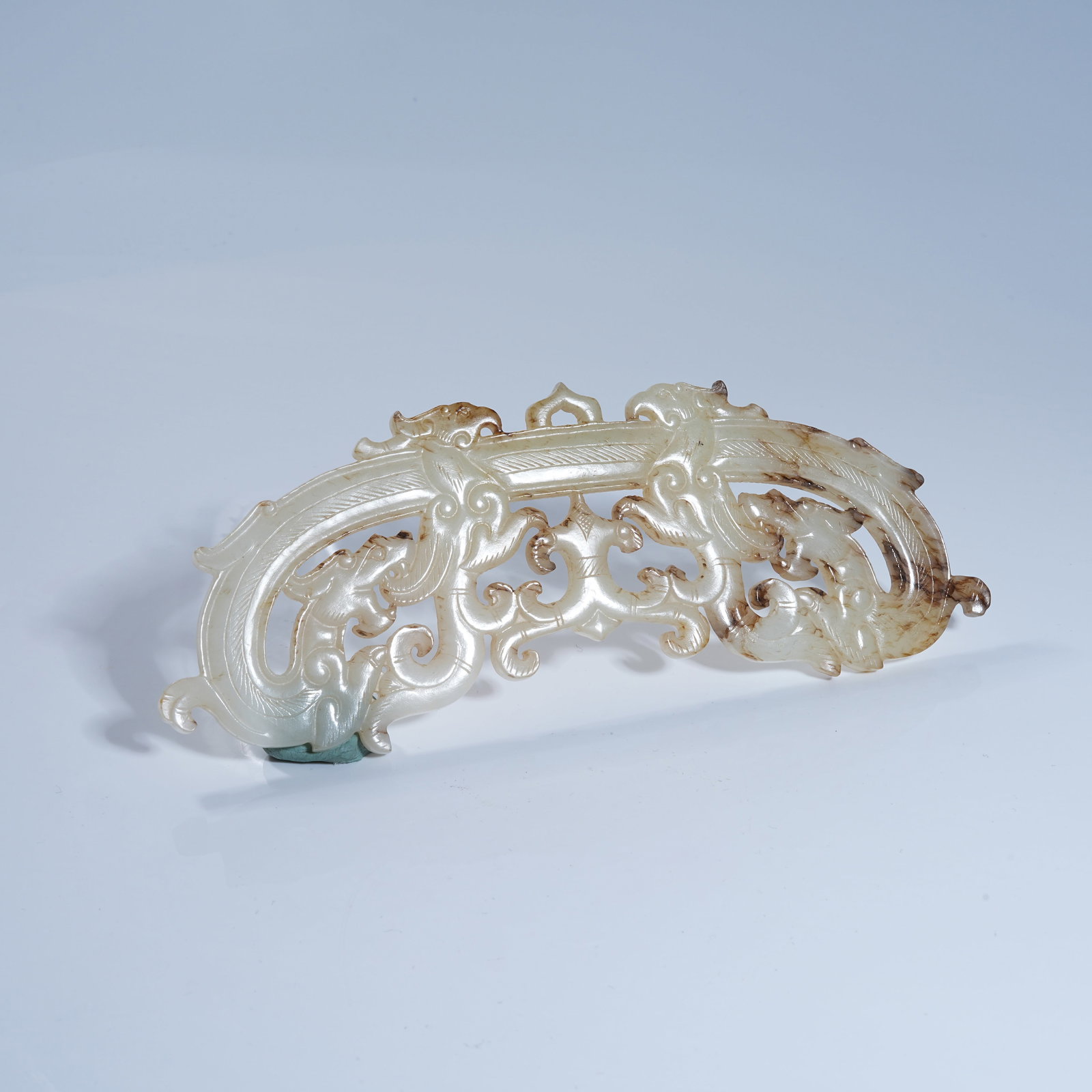 A ANCIENT JADE DOUBLE DRAGON PENDANT (1 of 8)
