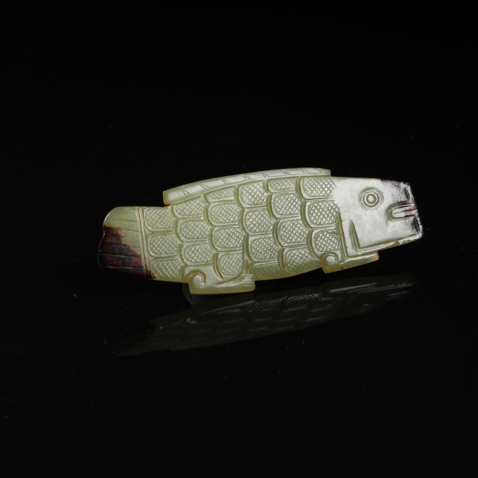 A ARCHAIC JADE FISH FIGURINE: Archaic jade fish figurine