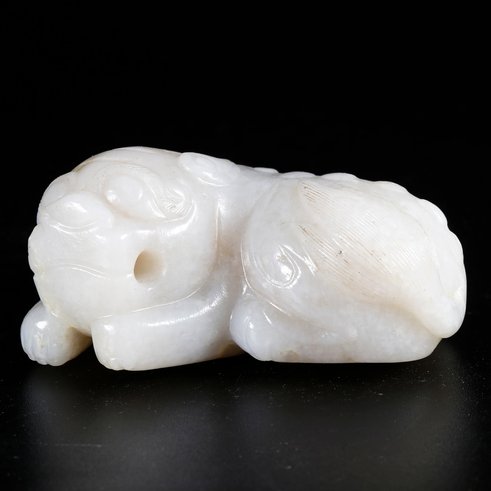A HETIAN JADE CARVED TIGER-SHAPED HAND PIECE (1 of 9)