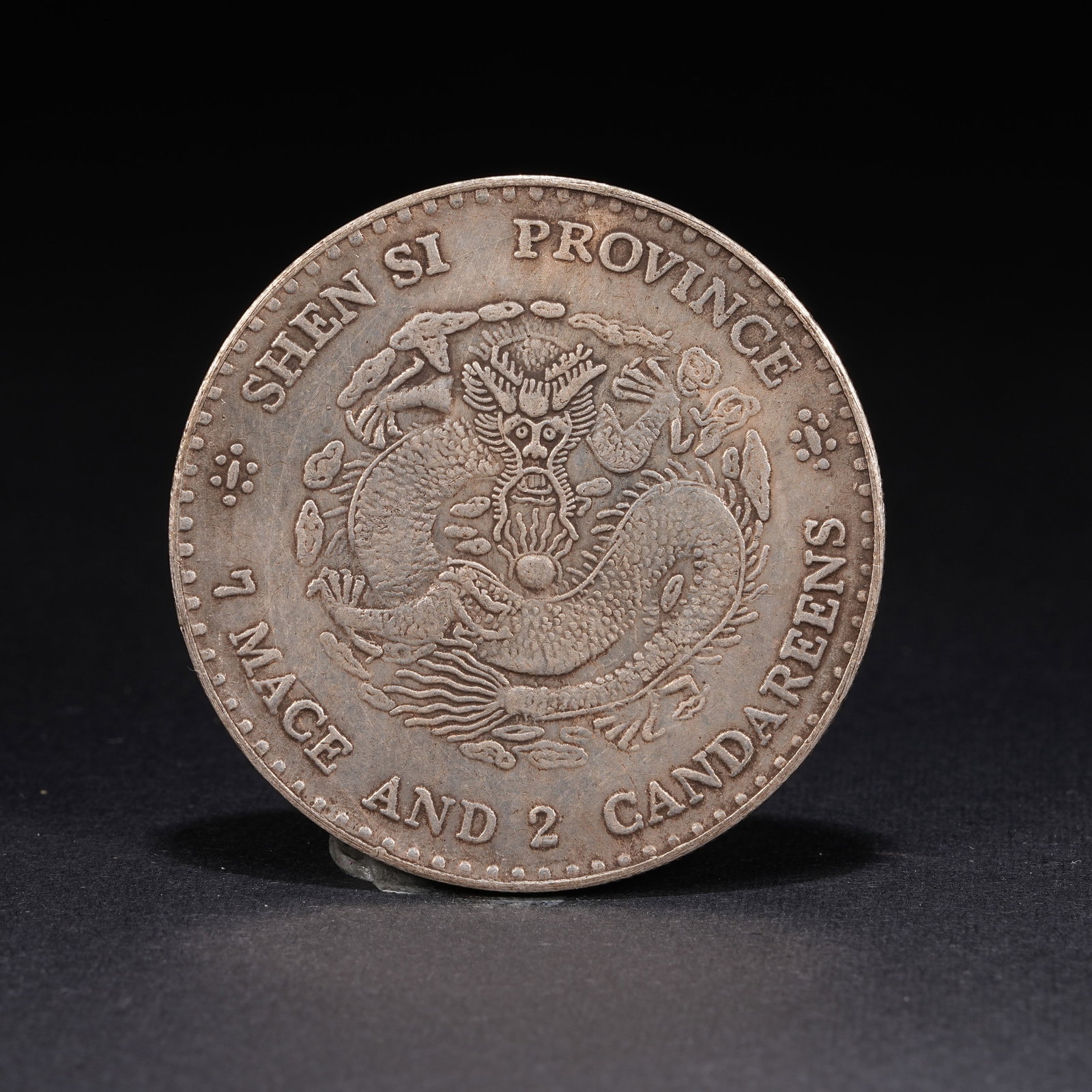 A SILVER DOLLAR COIN - 3