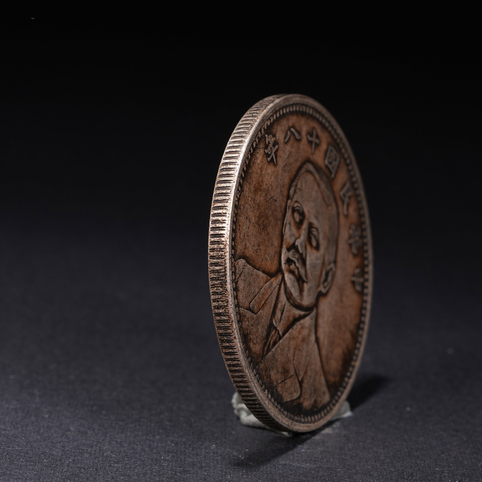 A SILVER DOLLAR COIN - 2
