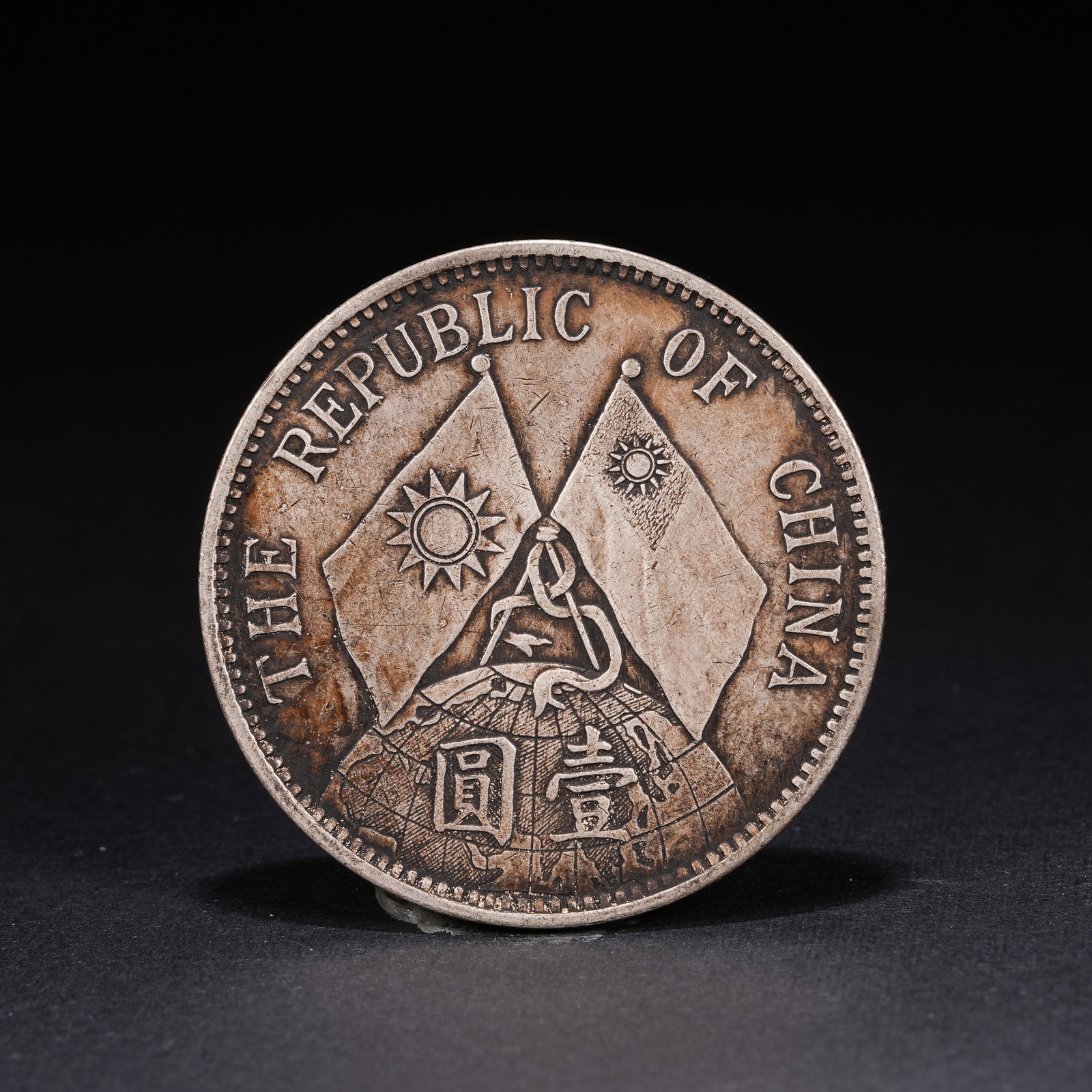 A SILVER DOLLAR COIN - 3