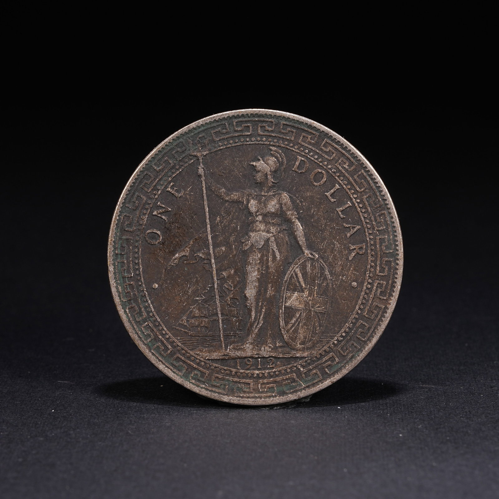 A SILVER DOLLAR COIN (1 of 3)