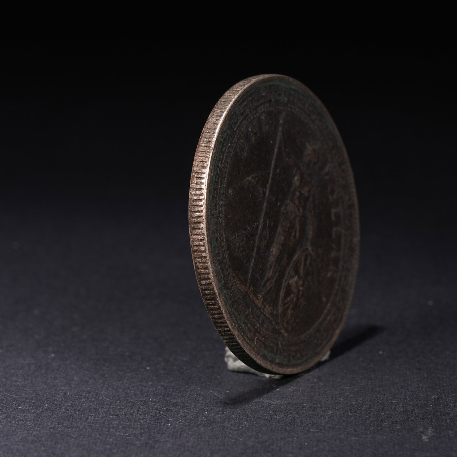 A SILVER DOLLAR COIN - 2