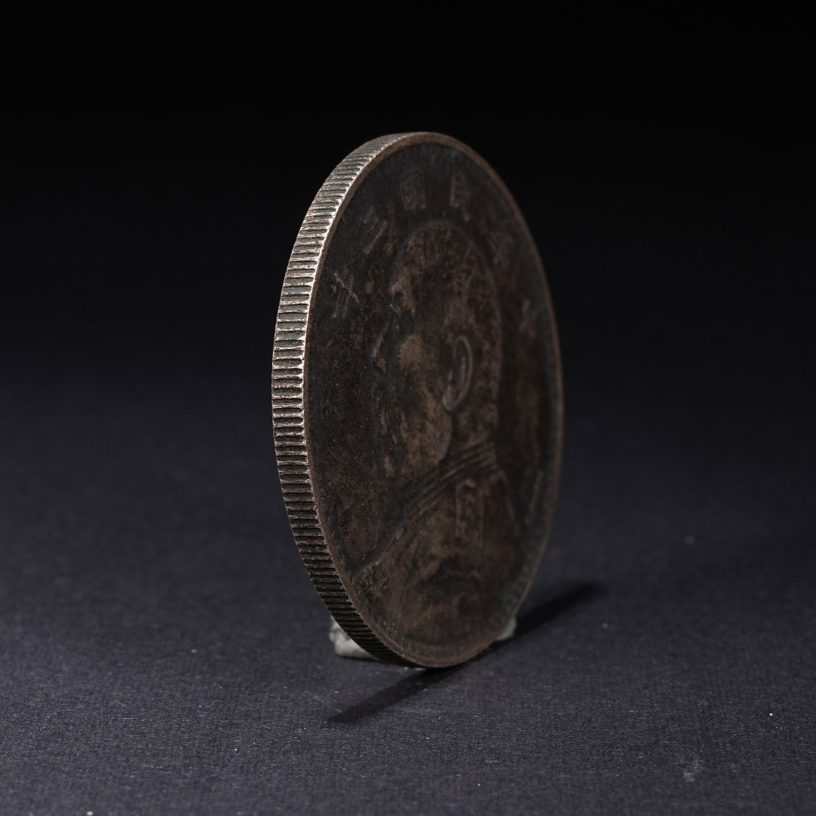 A SILVER DOLLAR COIN - 2