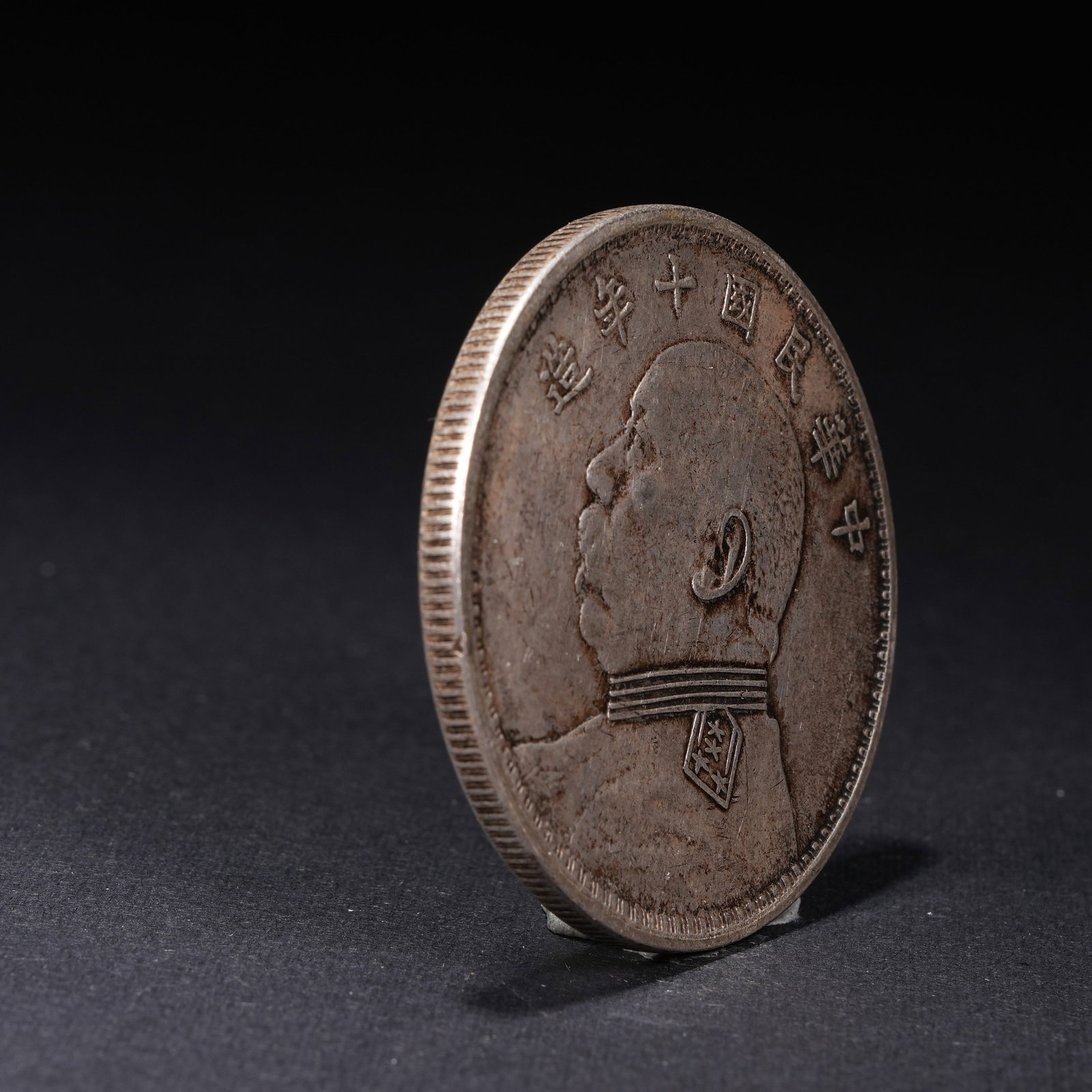 A SILVER DOLLAR COIN - 2