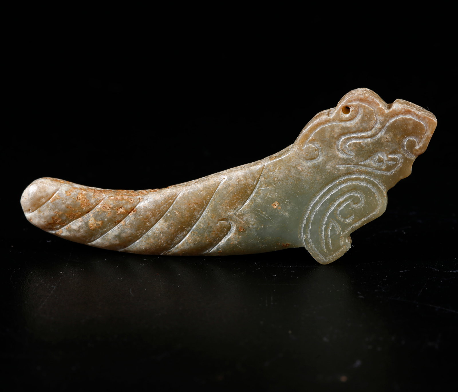 A ANCIENT JADE CARVED BEAST-SHAPED PENDANT: Ancient Jade Carved Beast-shaped Pendant