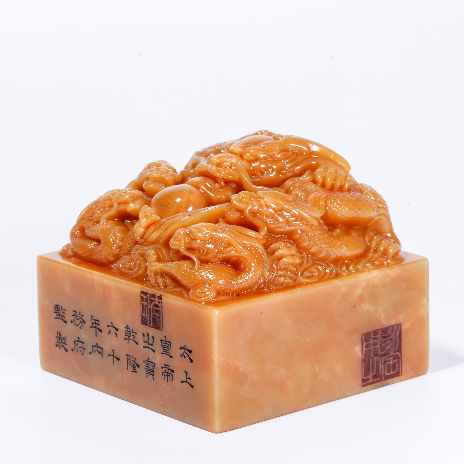 A SHOUSHAN TIANHUANG STONE SEAL WITH FIVE-DRAGON MOTIF: Shoushan Tianhuang Stone Seal with Five-Dragon Motif