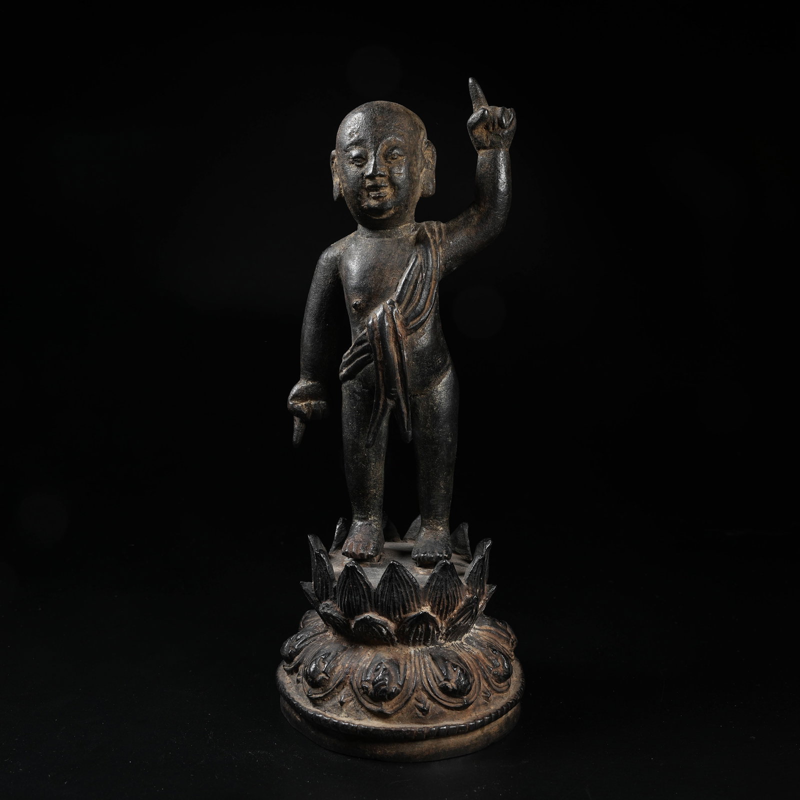 A STANDING BRONZE STATUE OF BOY ATTENDANT: Standing Bronze Statue of Boy Attendant