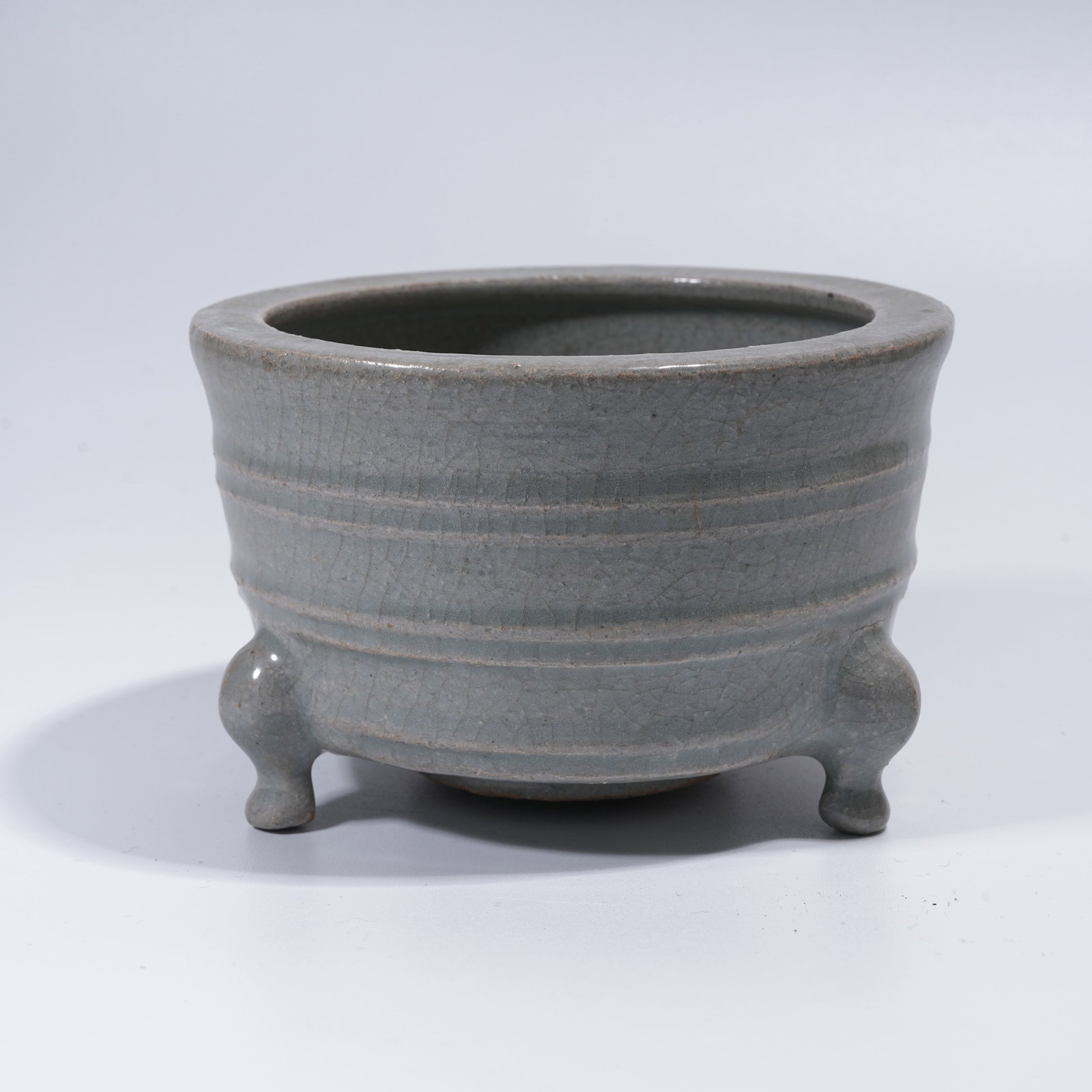 A LONGQUAN KILN THREE-LEGGED STRING-PATTERN CENSER (1 of 9)