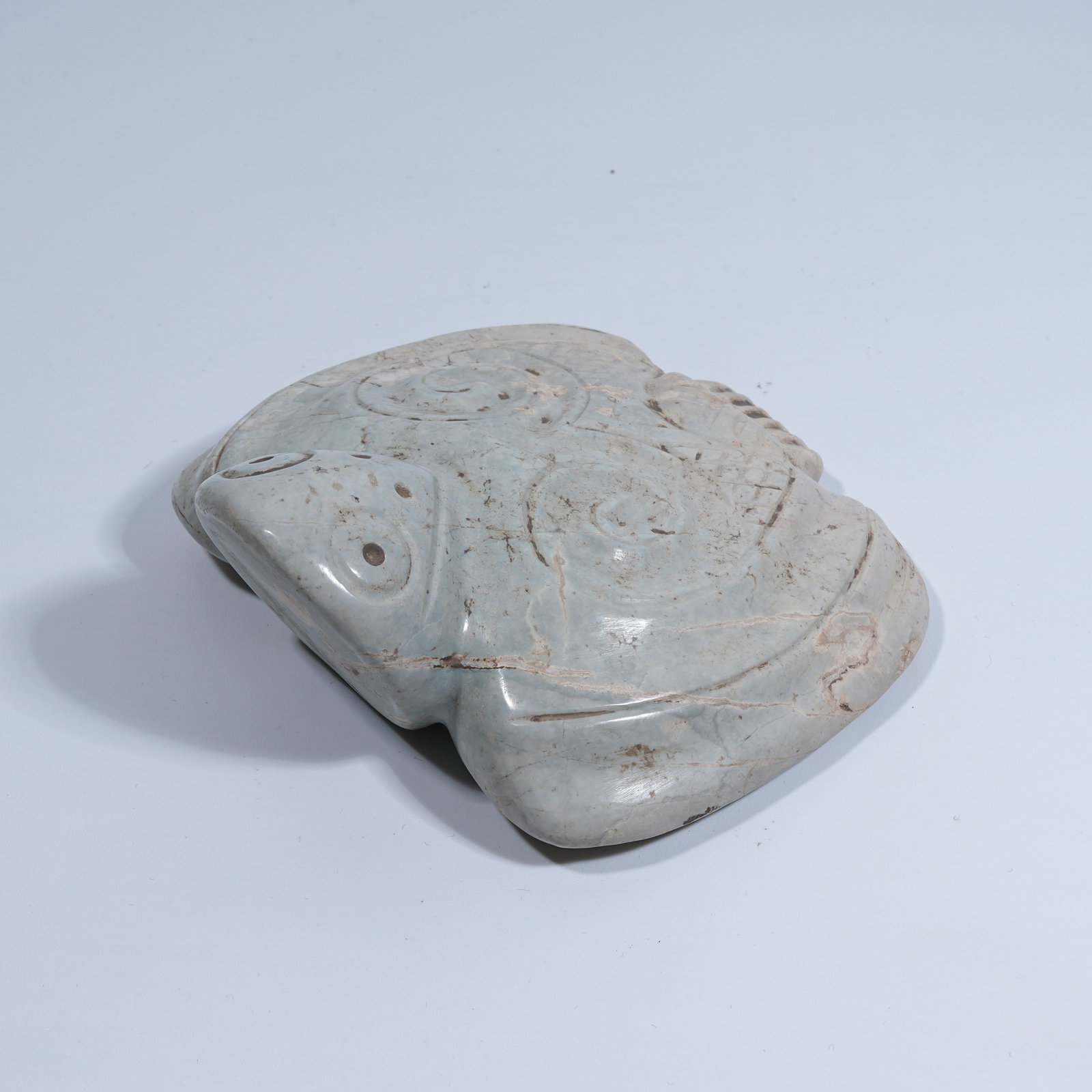 A HONGSHAN CULTURE ARCHAIC JADE ANTHROPOMORPHIC FACE OWL PENDANT: Hongshan Culture archaic jade anthropomorphic face owl pendant