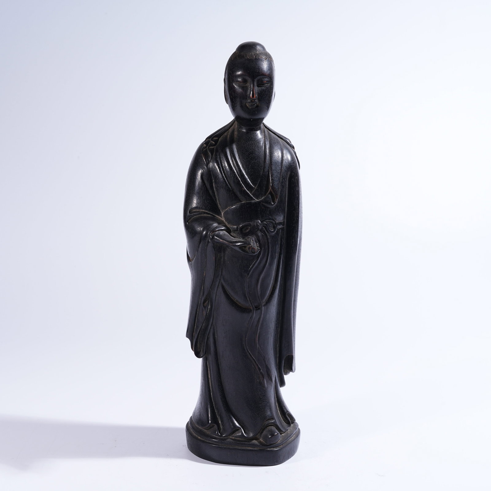 A ZITAN STANDING GUANYIN FIGURE HOLDING A SCROLL (1 of 9)