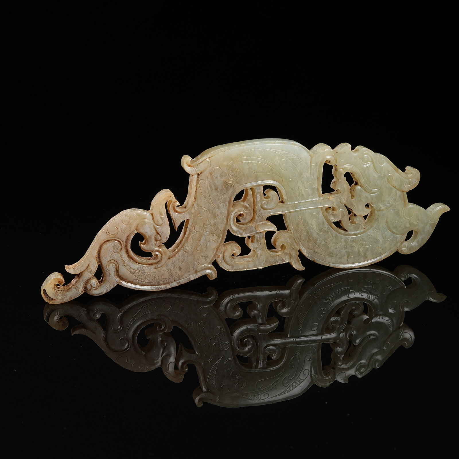 A ARCHAIC JADE S-SHAPED DRAGON PENDANT (1 of 9)