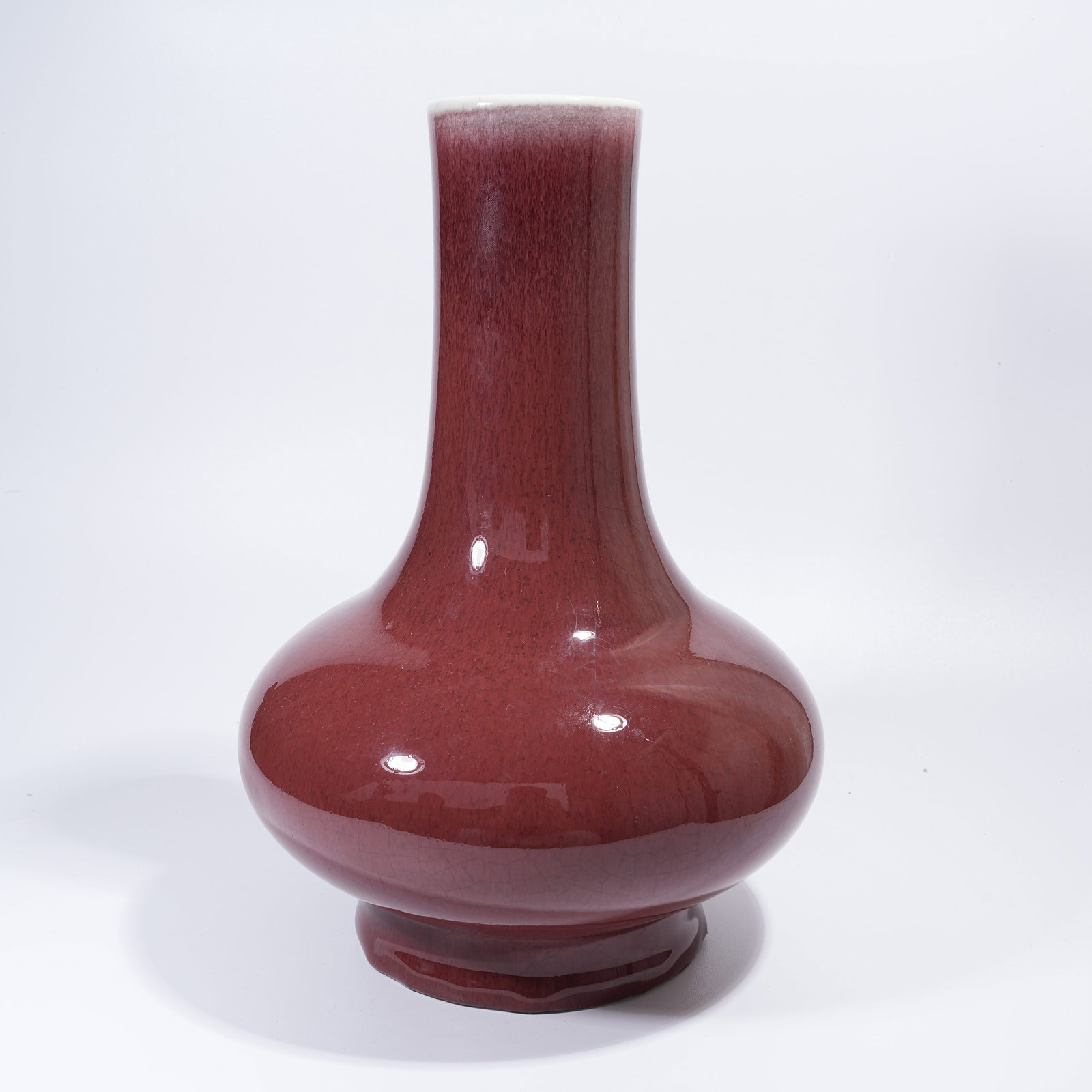A SACRIFICIAL RED GLAZE WATER CHESTNUT VASE (1 of 9)