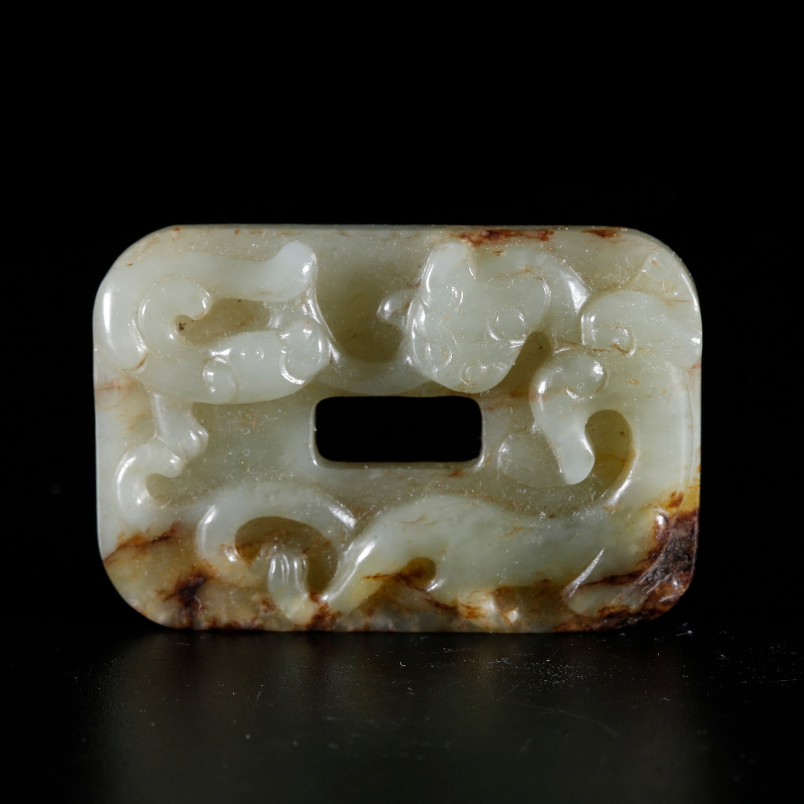 A HETIAN JADE BELT PLAQUE CARVED WITH BEAST PATTERNS: Hetian Jade Belt Plaque Carved with Beast Patterns