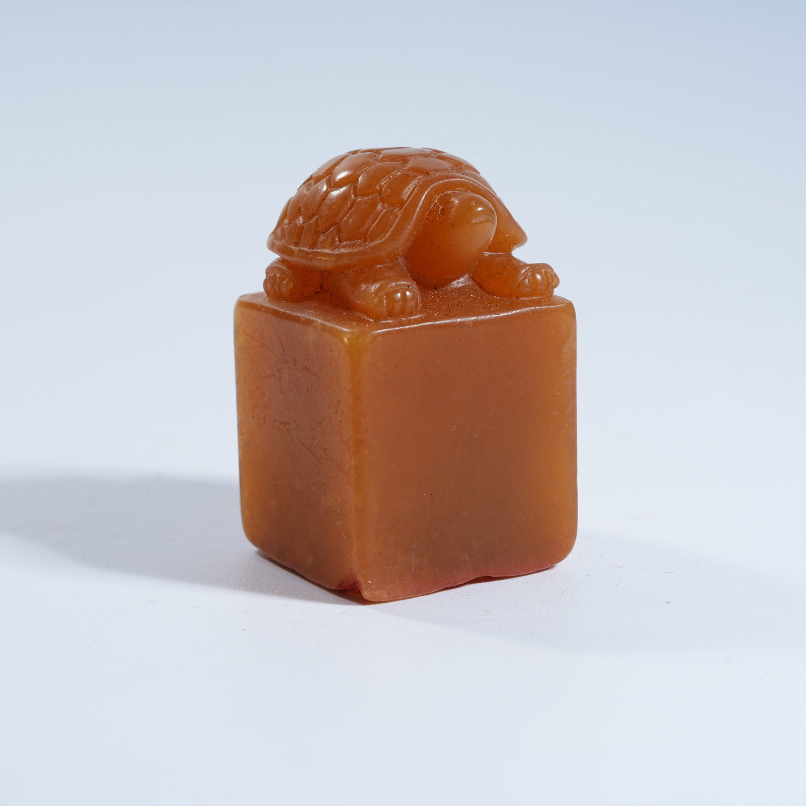 A SHOUSHAN TIANHUANG STONE SEAL WITH TURTLE KNOB: Shoushan Tianhuang Stone Seal with Turtle Knob