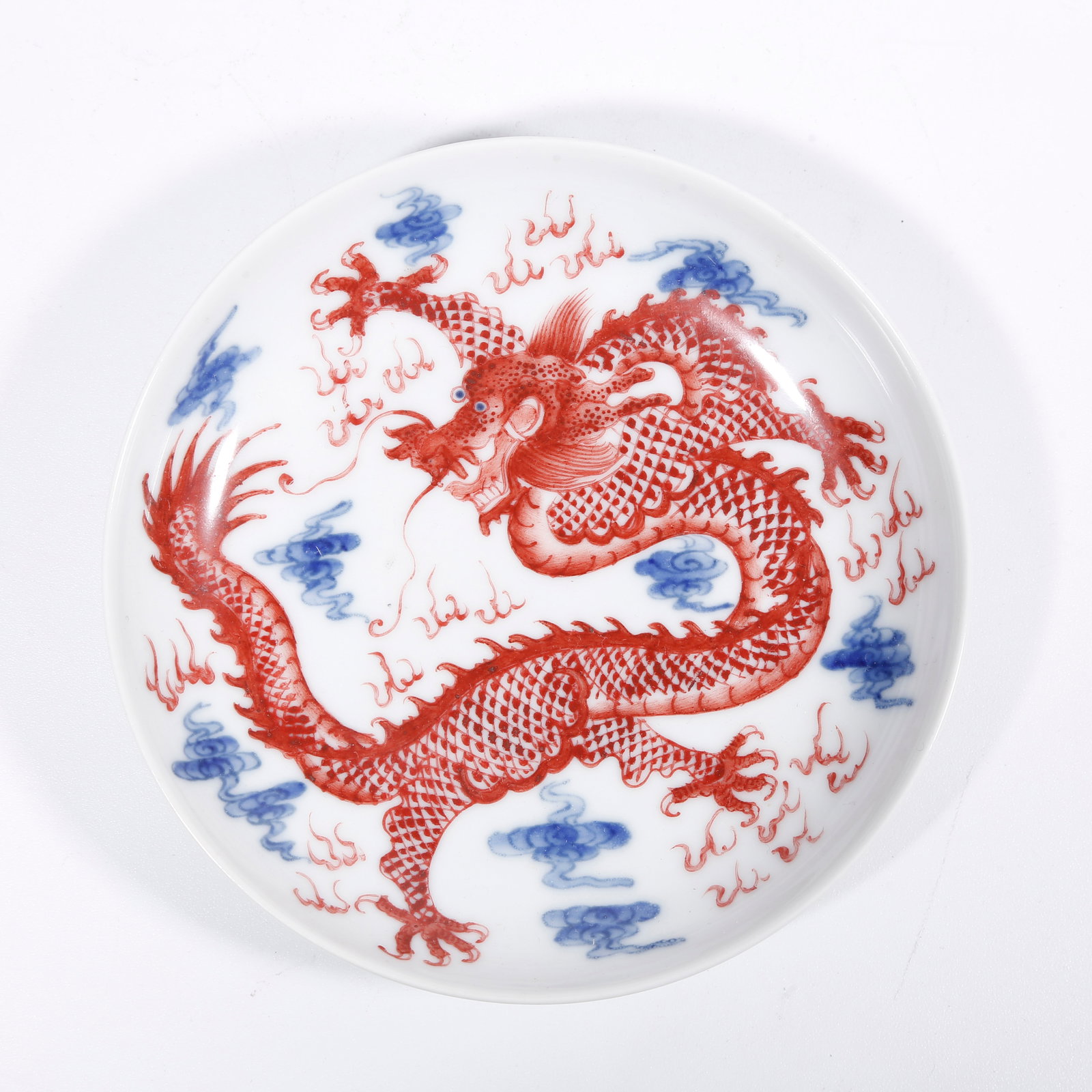 A BLUE AND WHITE IRON-RED PLATE WITH CLOUD AND DRAGON PATTERN (1 of 9)