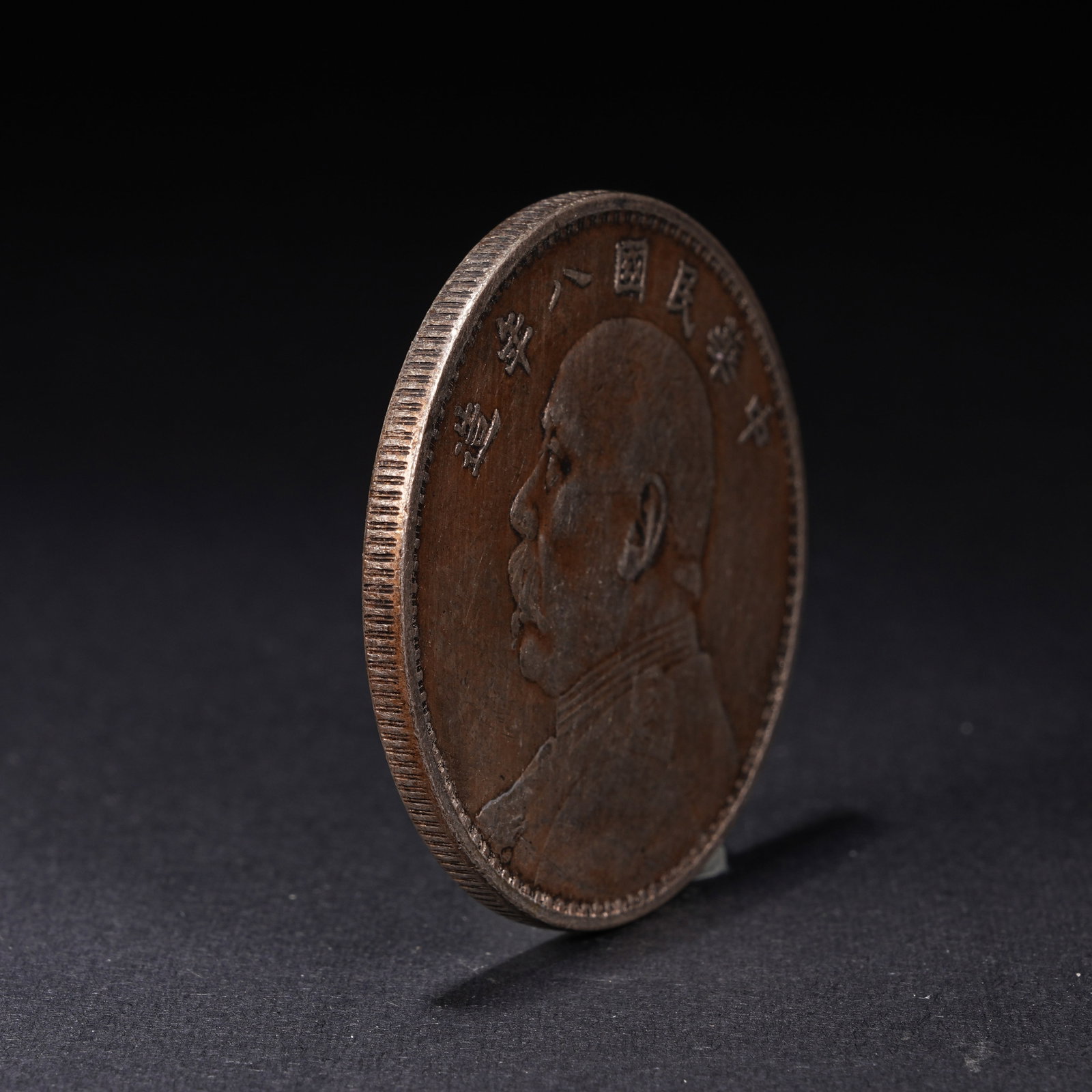 A SILVER DOLLAR COIN - 2