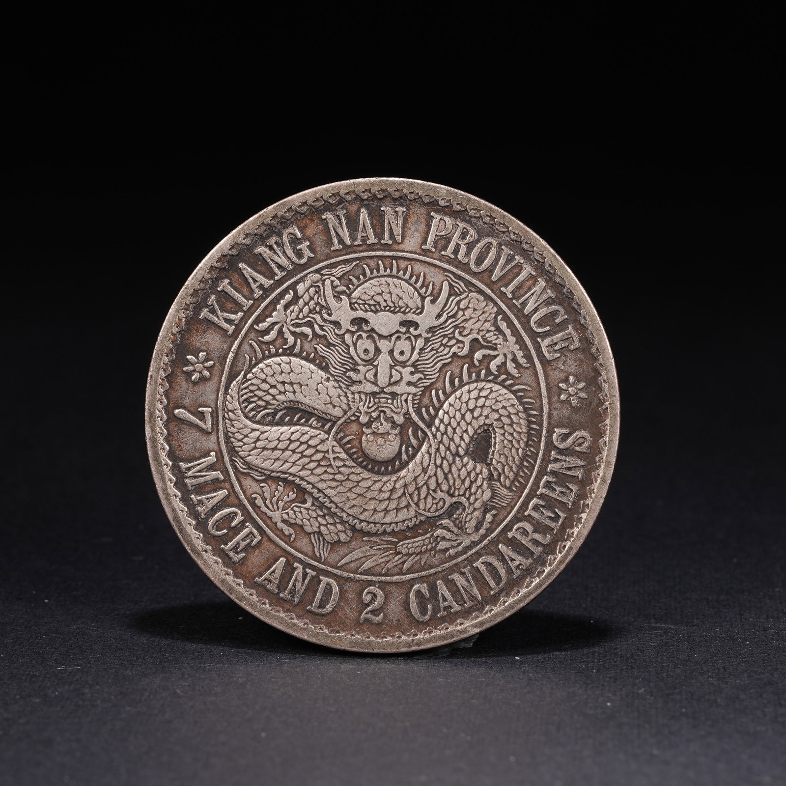 A SILVER DOLLAR COIN - 3