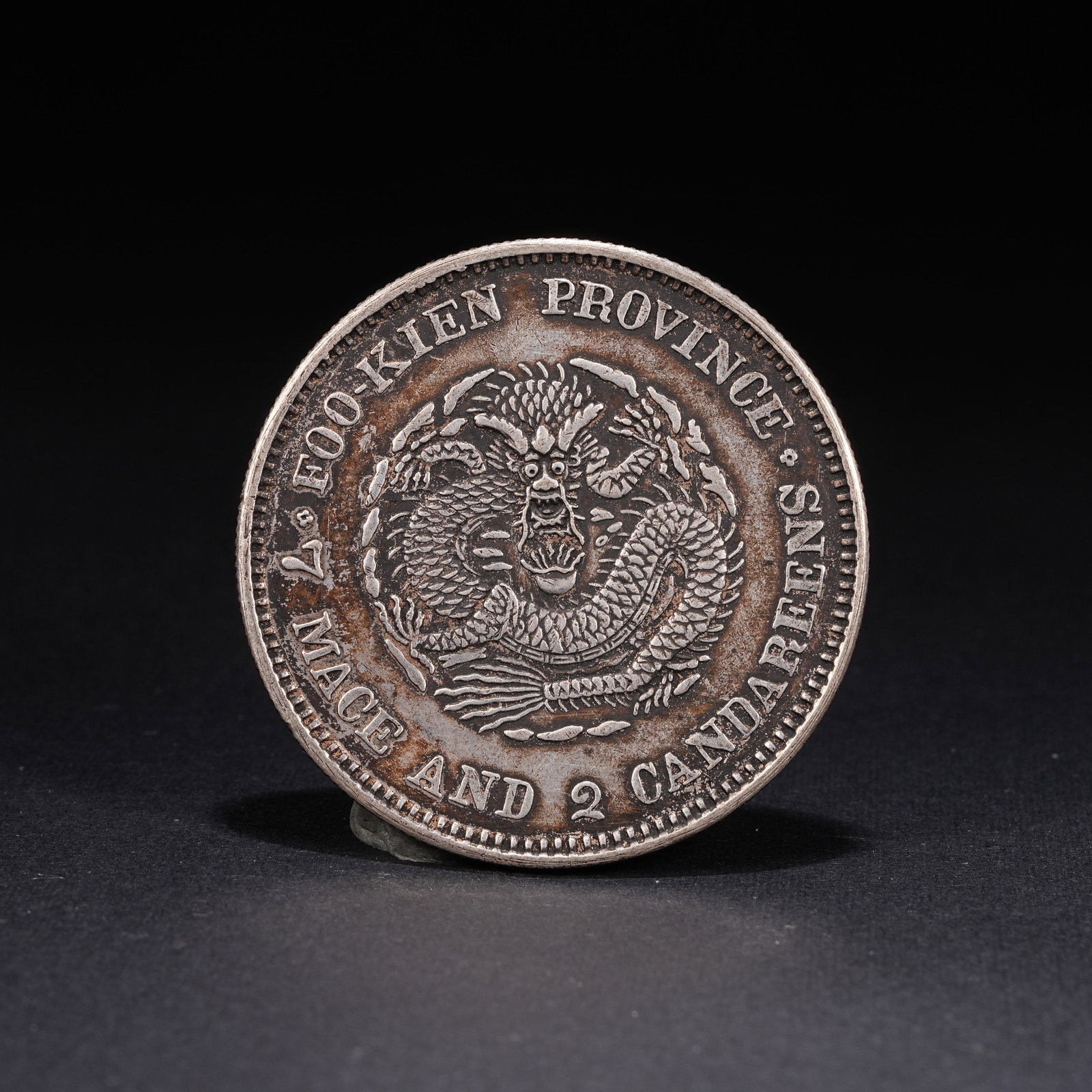 A SILVER DOLLAR COIN - 3
