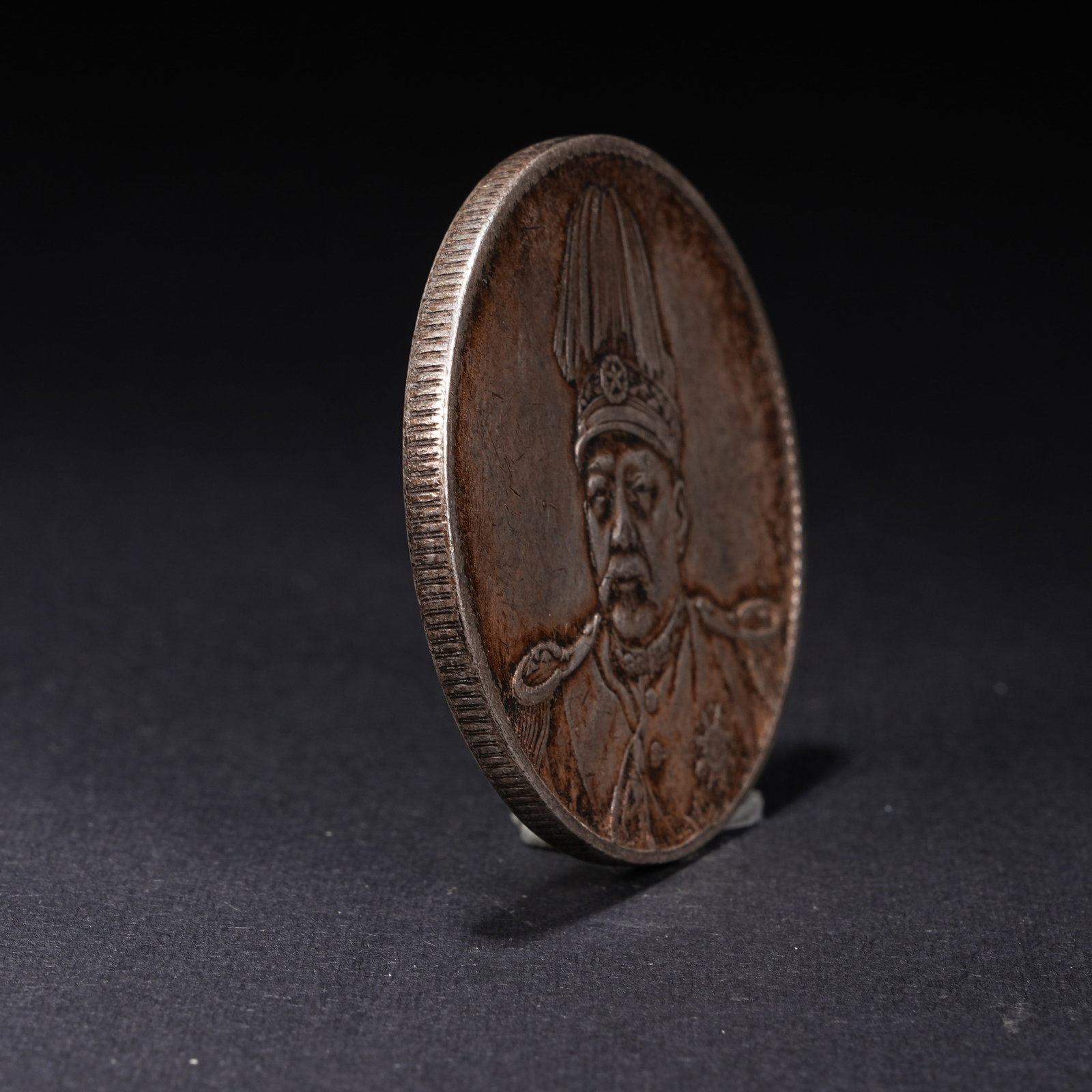 A SILVER DOLLAR COIN - 2