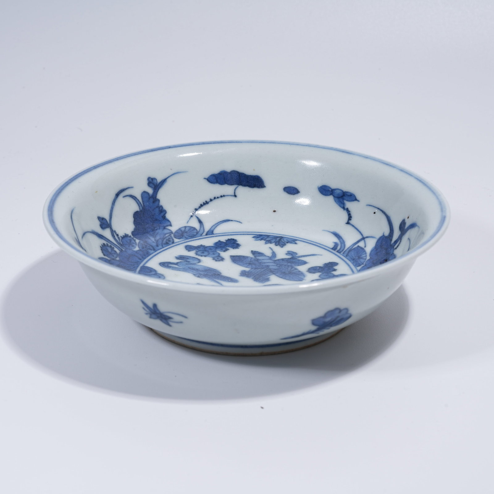A BLUE AND WHITE BOWL WITH LOTUS POND MANDARIN DUCK PATTERN (1 of 8)