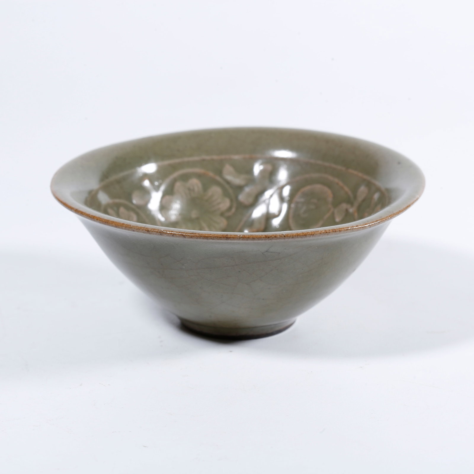 A YAOZHOU WARE SCROLLING FLORAL AND BOY MOTIF CUP (1 of 9)
