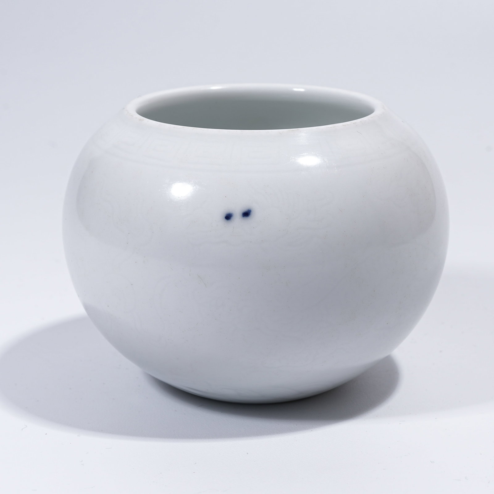 A WHITE GLAZE SUBTLY CARVED DRAGON PATTERN WATER POT: White Glaze Subtly Carved Dragon Pattern Water Pot