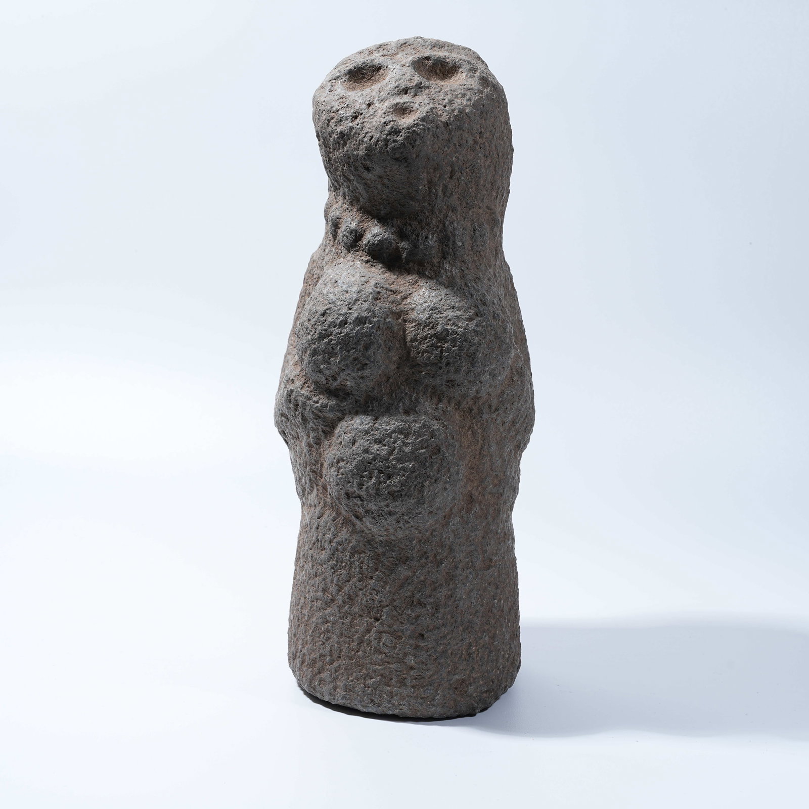 A BASALT HONGSHAN CULTURE ANTHROPOMORPHIC DEITY FIGURINE: Basalt Hongshan Culture anthropomorphic deity figurine