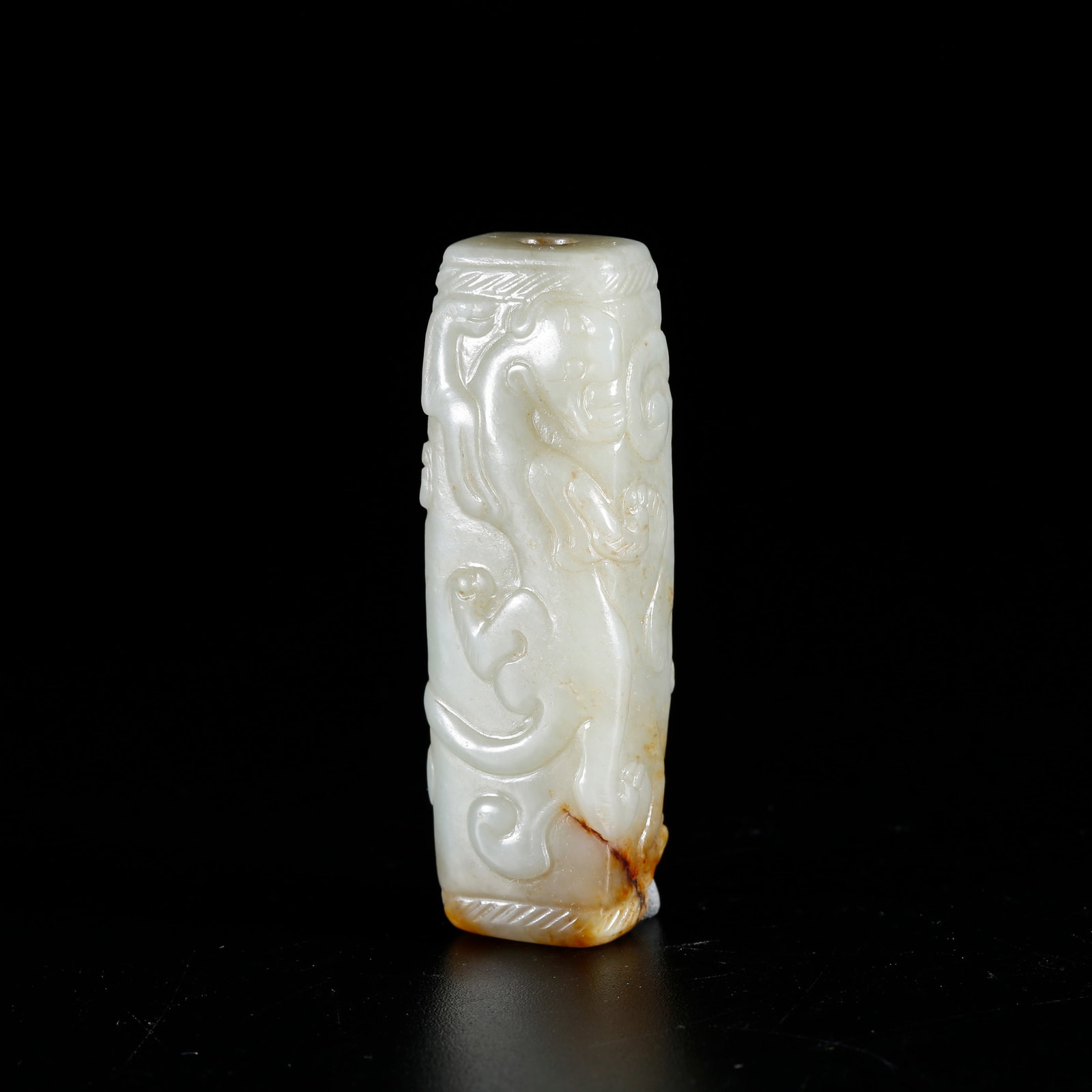 A HETIAN JADE LEZI CARVED WITH DRAGON PATTERN: Hetian Jade Lezi Carved with Dragon Pattern