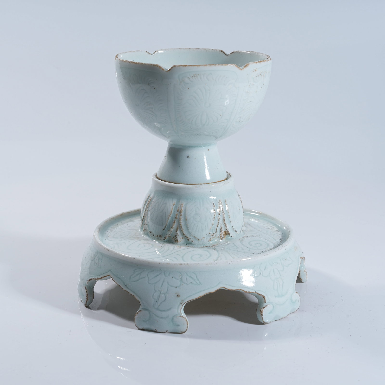 A SET OF SHADOW GREEN GLAZED CUP STANDS (1 of 8)