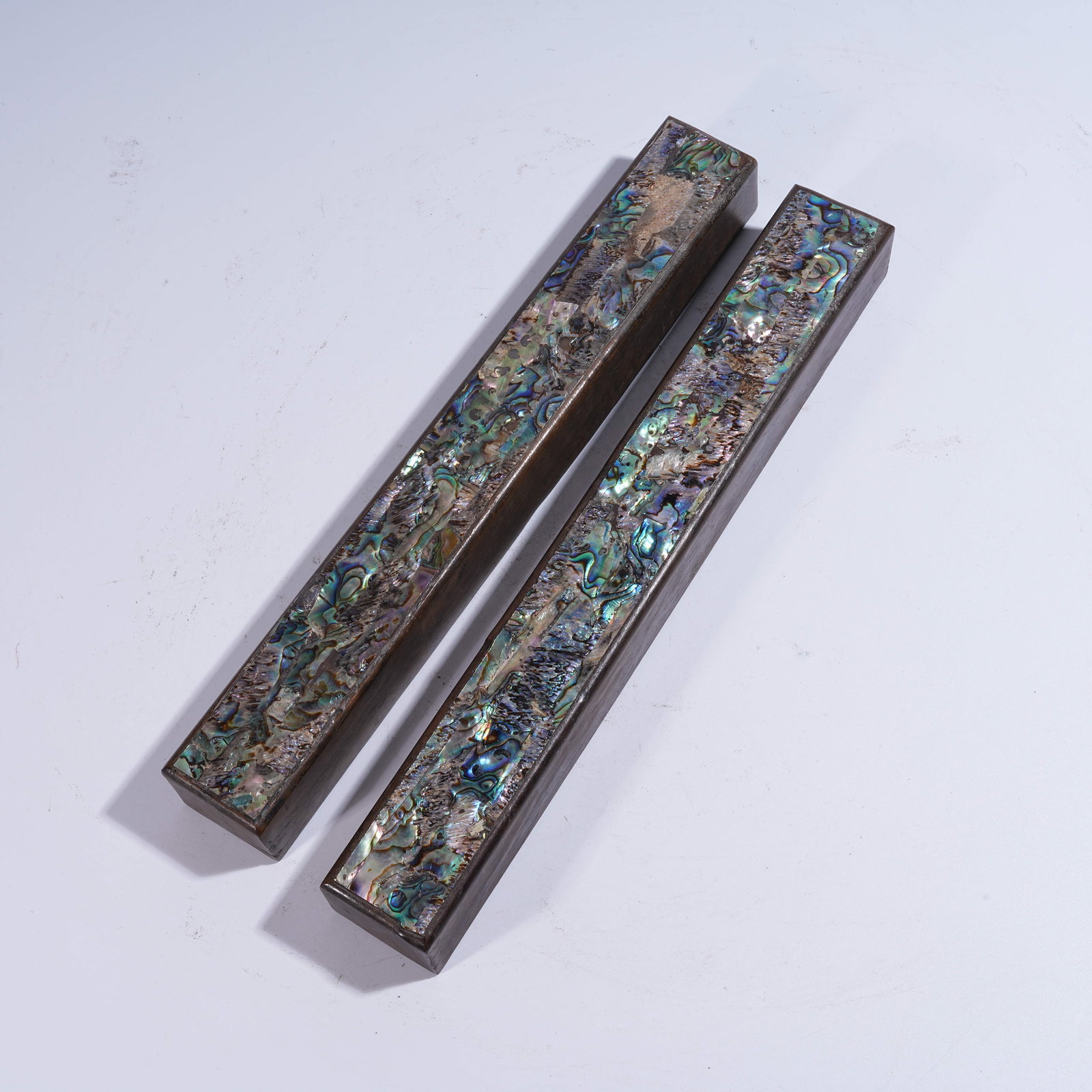 A SET OF HUANGHUALI PAPERWEIGHTS INLAID WITH MOTHER-OF-PEARL (1 of 8)