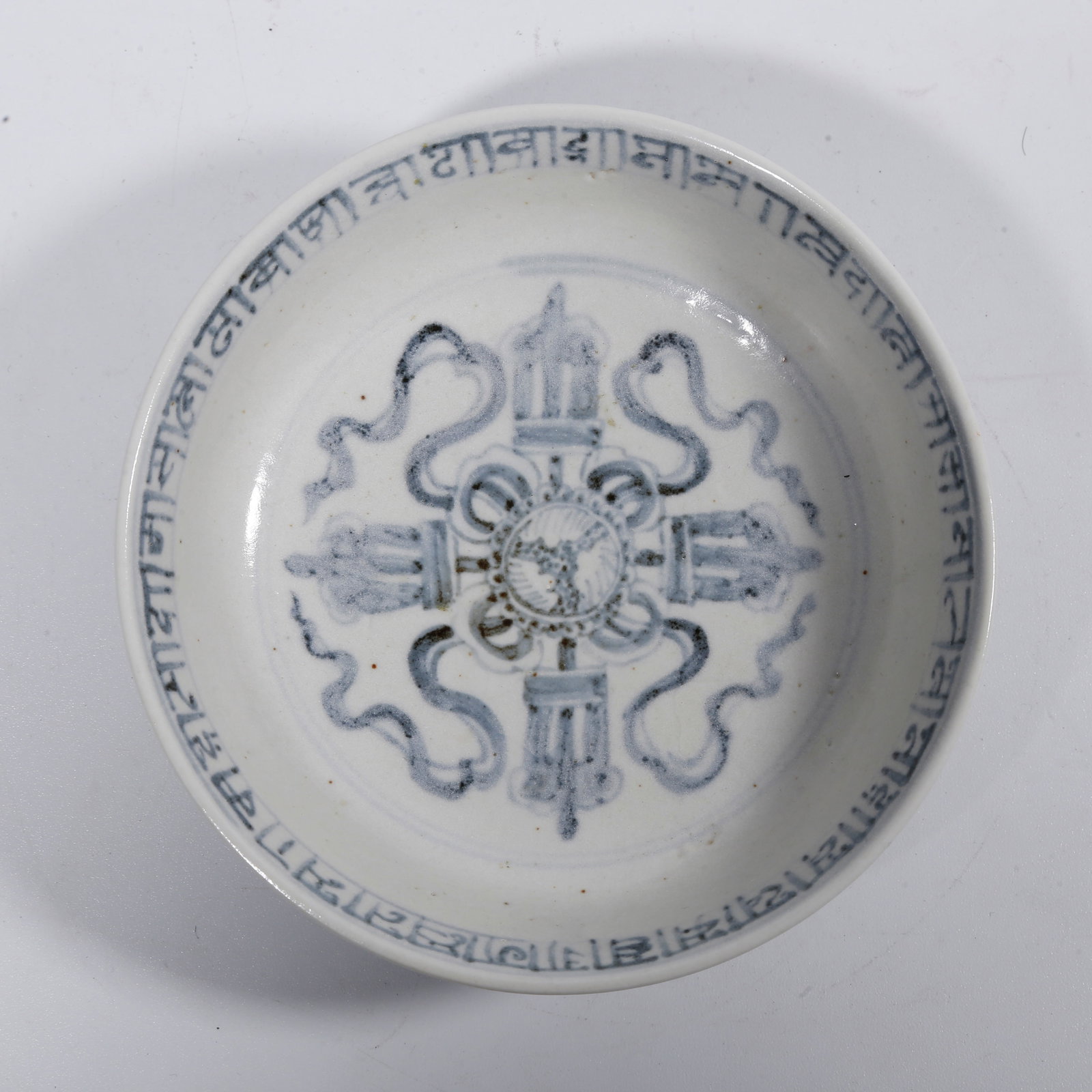 A BLUE AND WHITE PLATE: Blue and White Plate