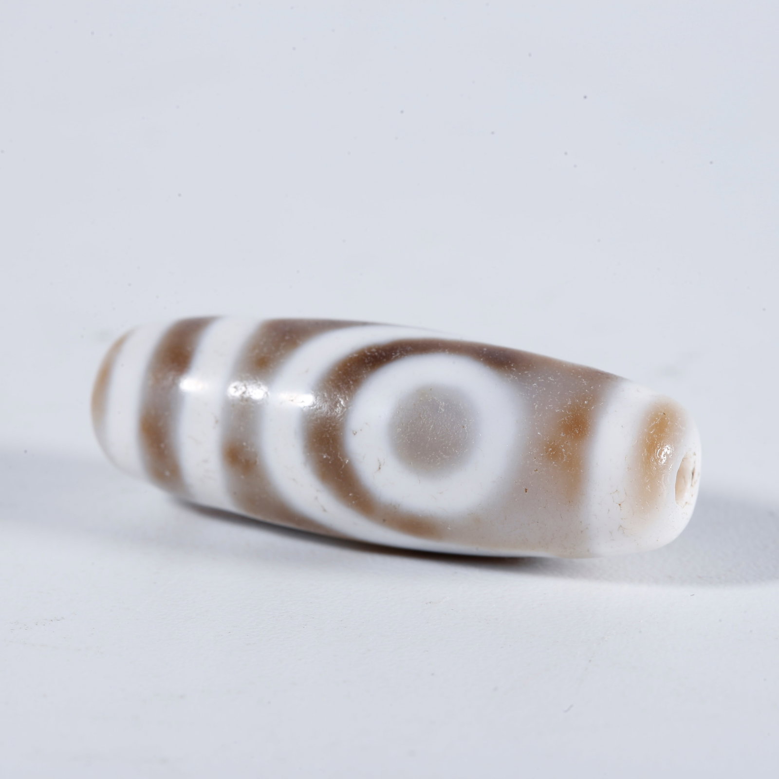A TWO-EYE DZI BEAD: Two-Eye Dzi Bead