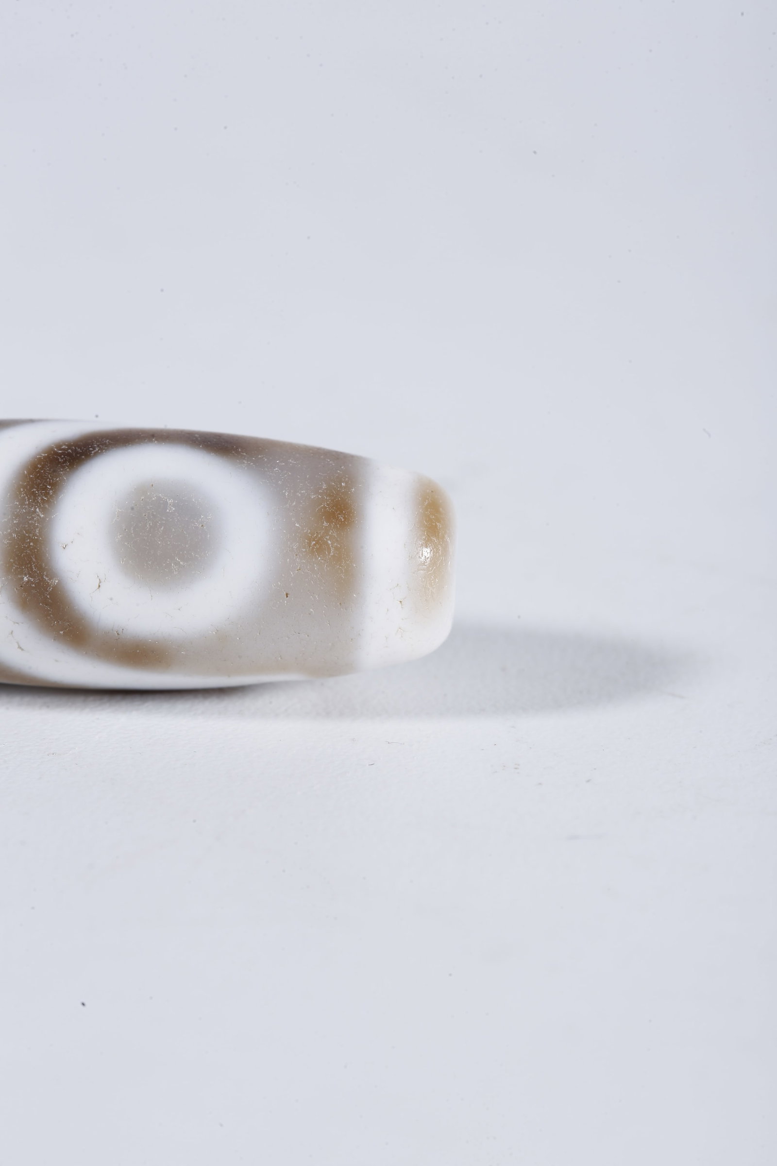 A TWO-EYE DZI BEAD - 2