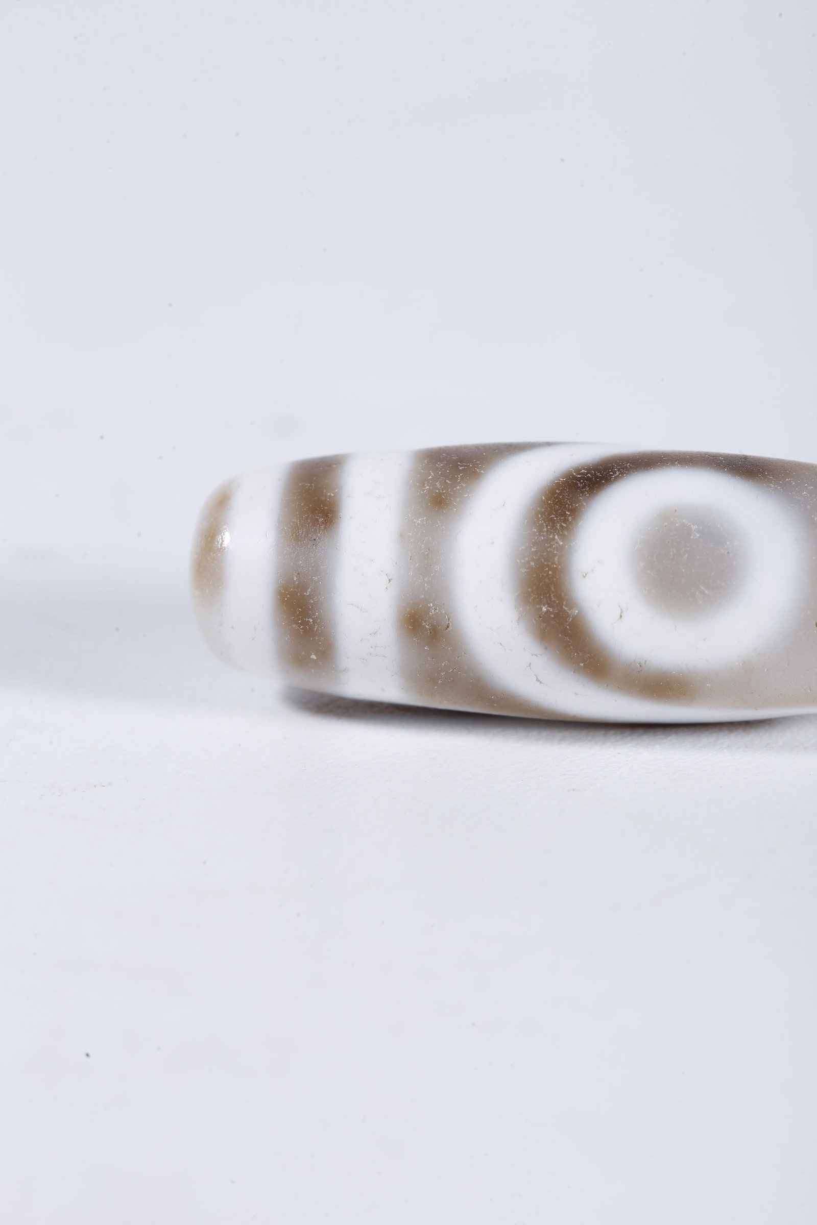 A TWO-EYE DZI BEAD - 3